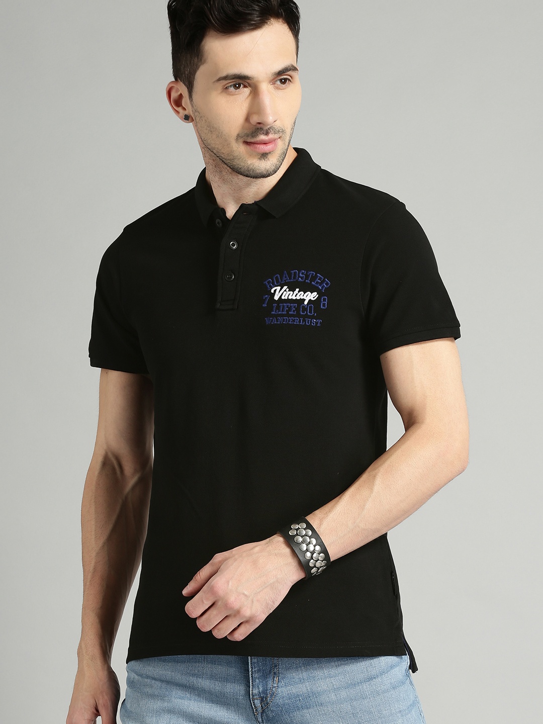 

The Roadster Lifestyle Co Men Black Solid Polo Collar Pure Cotton T-shirt