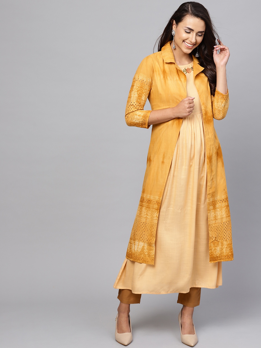 

Indo Era Women Mustard Yellow & Beige Solid A-Line Kurta