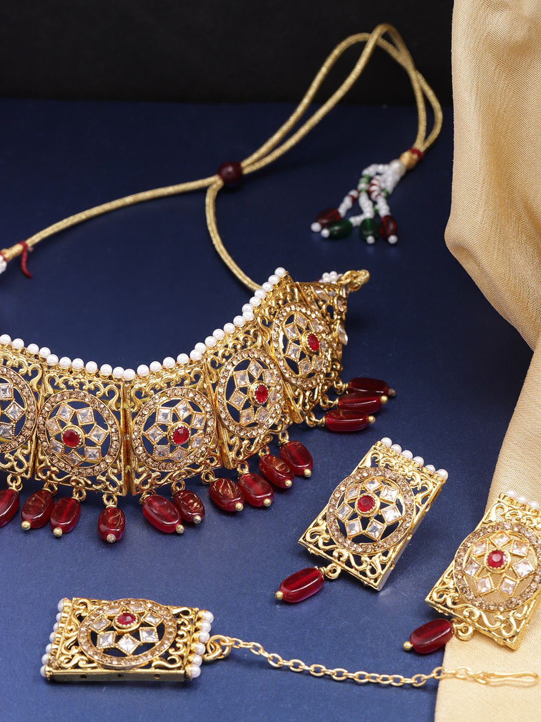 

Priyaasi Maroon Antique Gold-Plated Kundan-Studded Jewellery Set