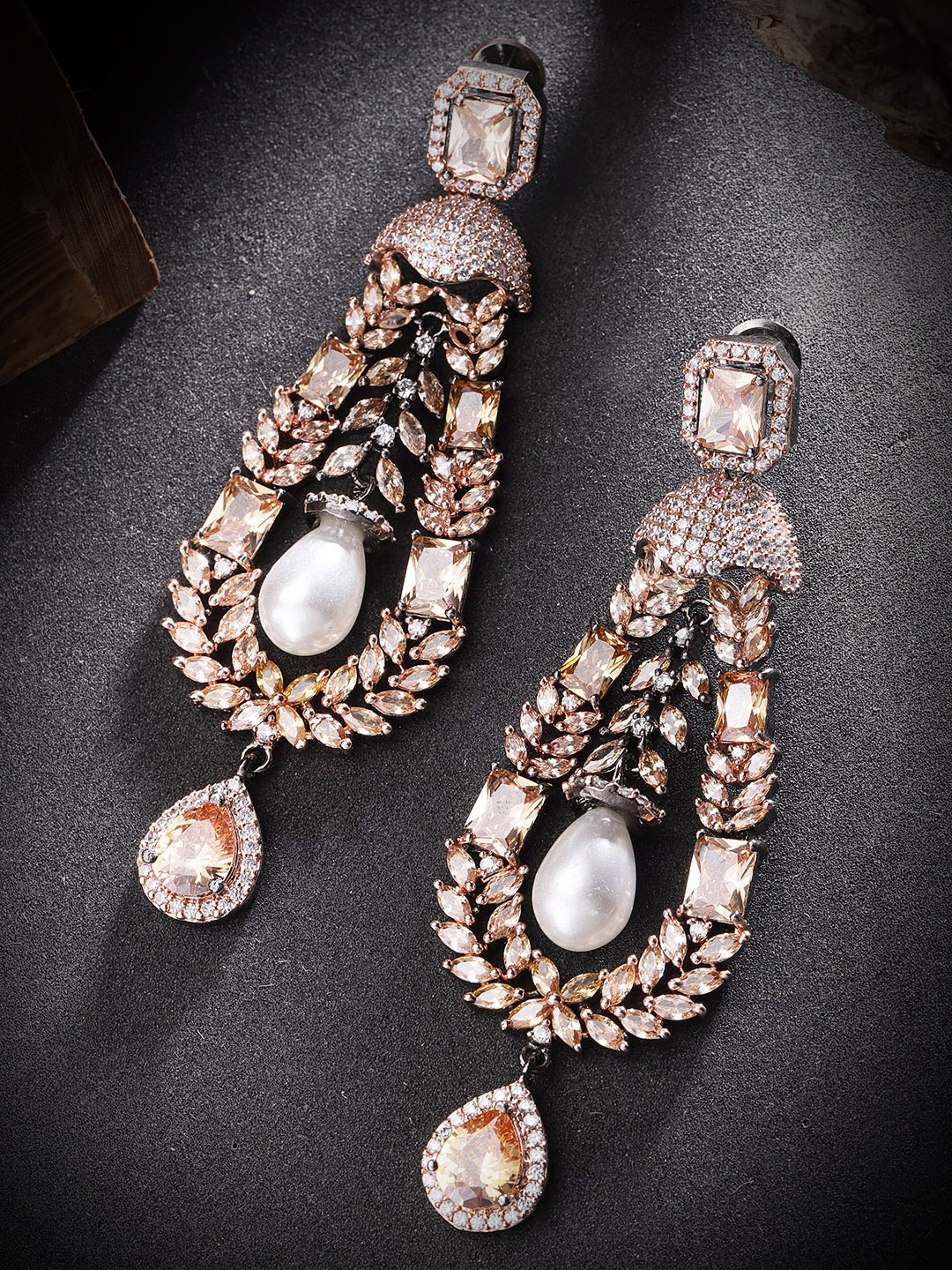 

Priyaasi Peach-Coloured Rhodium-Plated eardrop Shaped Drop Earrings