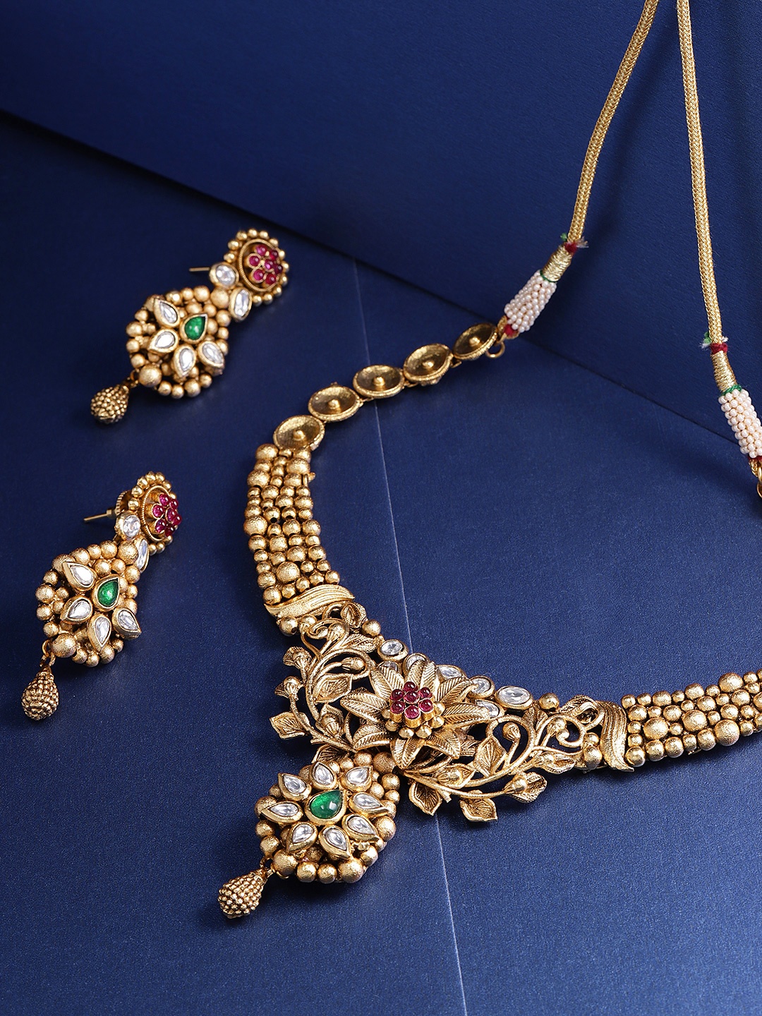 

Priyaasi Pink & Green Antique Gold-Plated Stone-Studded Floral Handcrafted Jewellery Set
