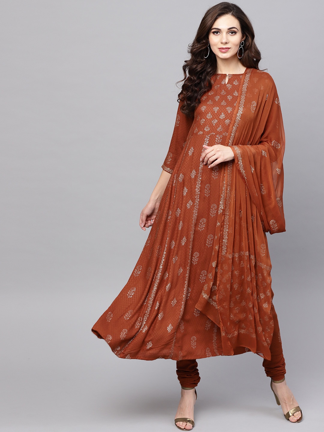 

Libas Women Rust Brown & Golden Printed Kurta with Churidar & Dupatta