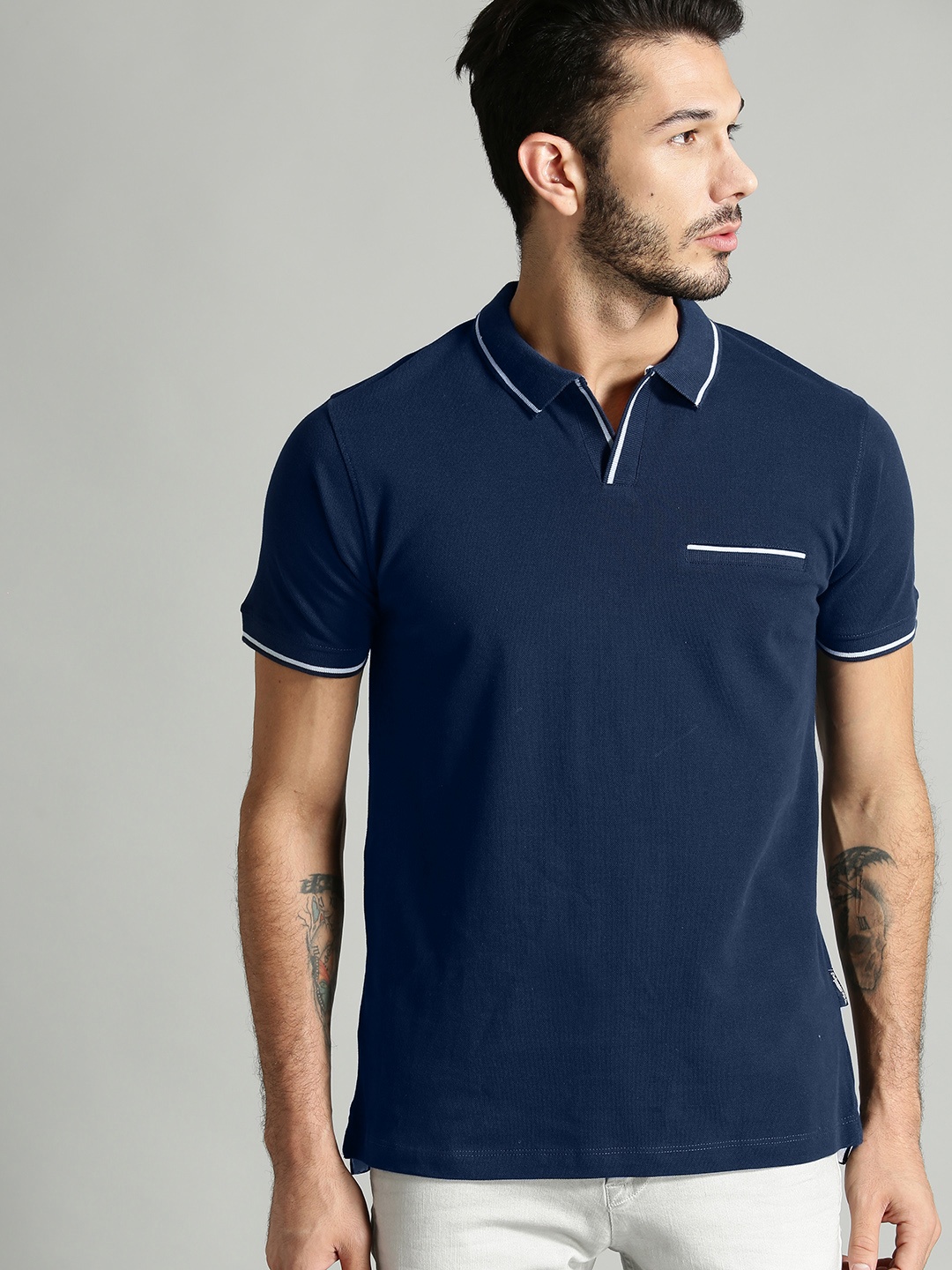 

Roadster Men Navy Blue Solid Polo Collar T-shirt