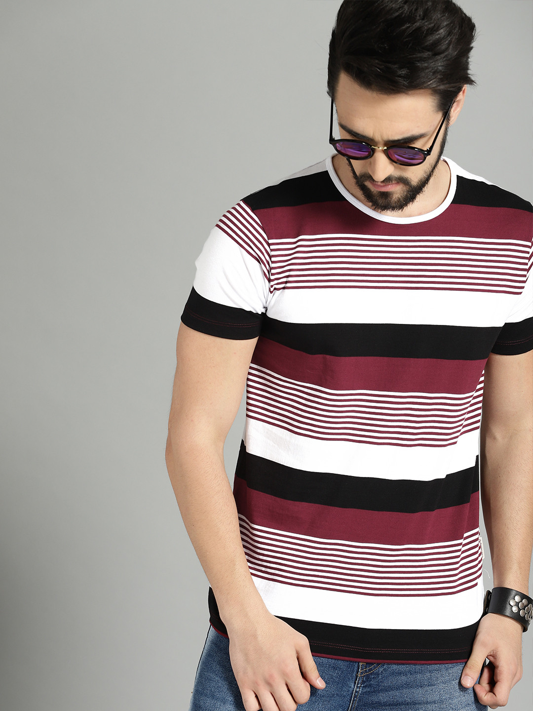 

Roadster Men Burgundy & Black Striped Round Neck T-shirt