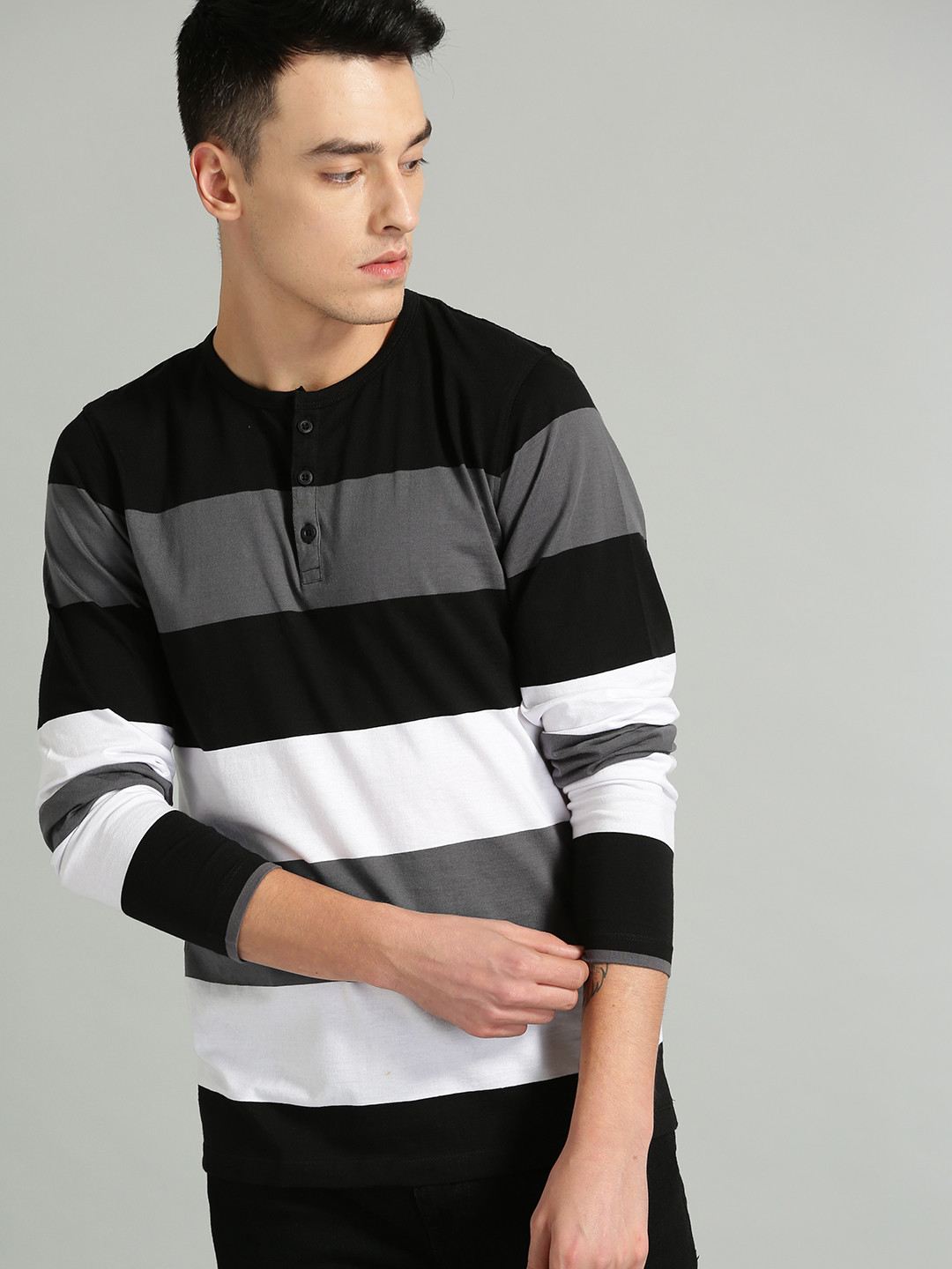 

The Roadster Lifestyle Co Men Black & White Colorblocked Henley Neck T-shirt