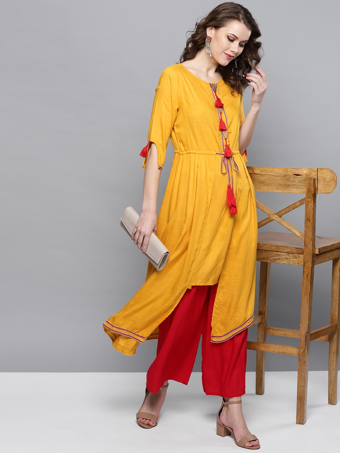 

STREET 9 Women Mustard Yellow Solid Asymmetric A-Line Kurta