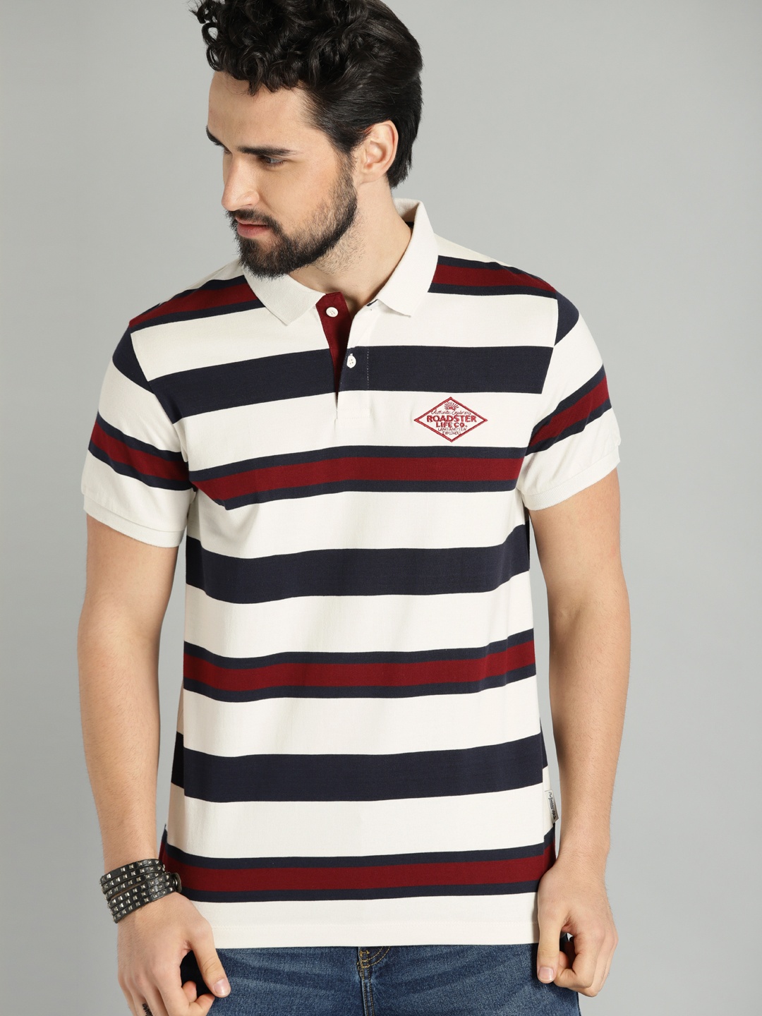 

The Roadster Lifestyle Co Men White Navy Blue Striped Polo Pure Cotton T-shirt