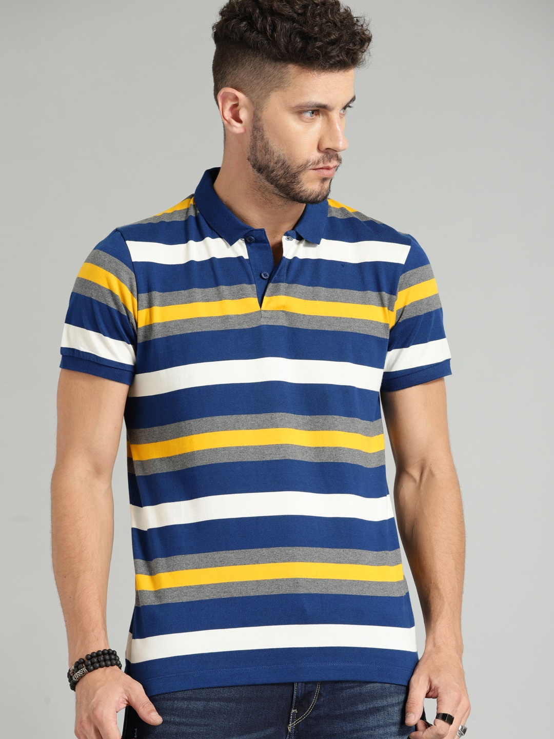 

The Roadster Lifestyle Co Men Blue Striped Polo Collar Pure Cotton T-shirt