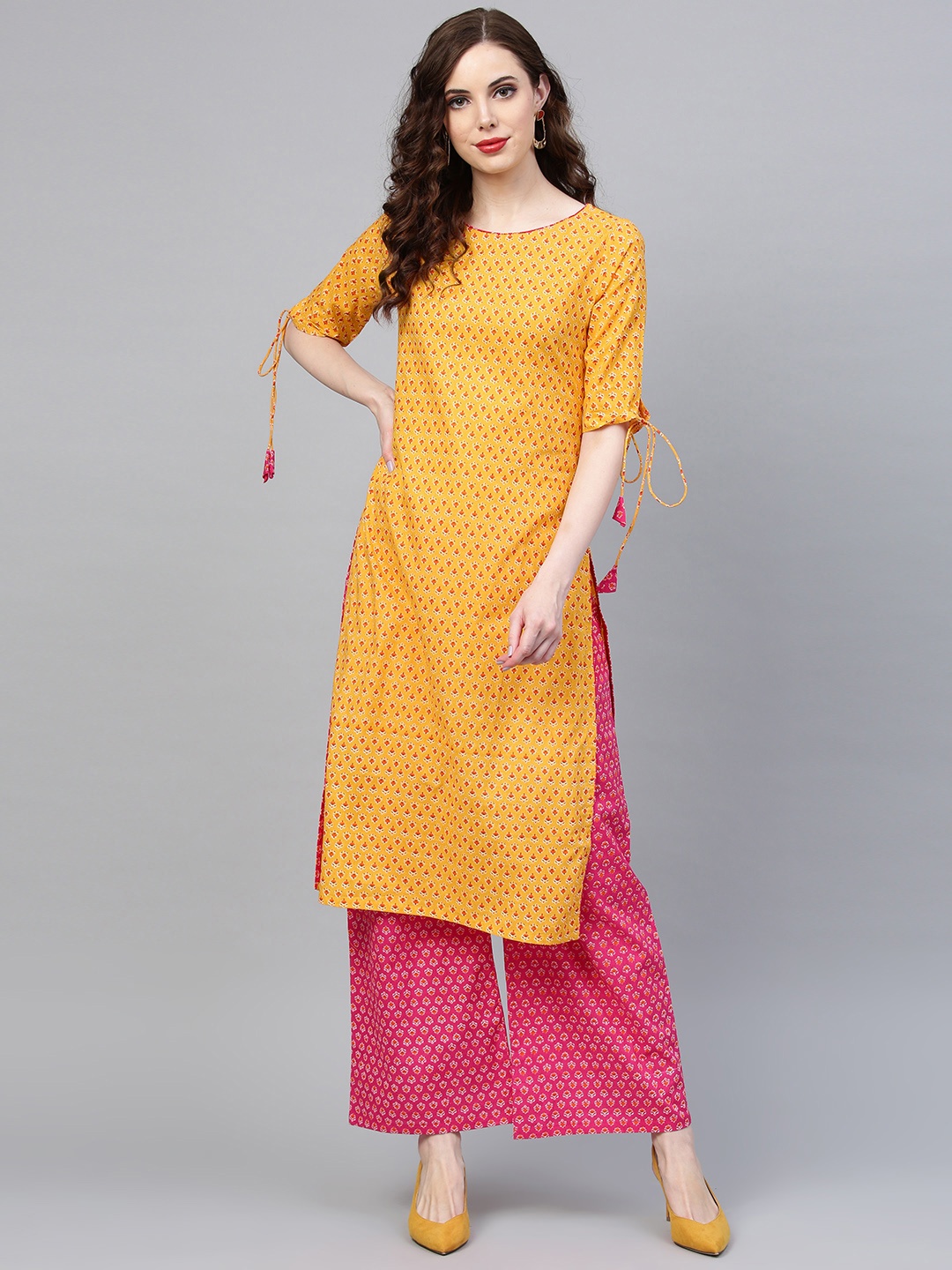 

Indo Era Women Yellow & Pink Printed Kurta with Palazzos