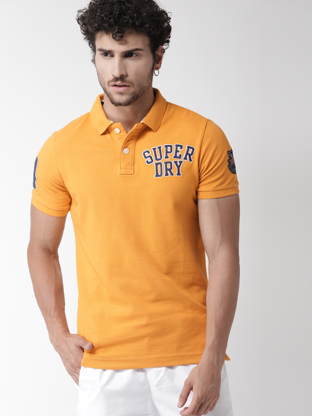 

Superdry Men Mustard Yellow Solid Polo Collar T-shirt