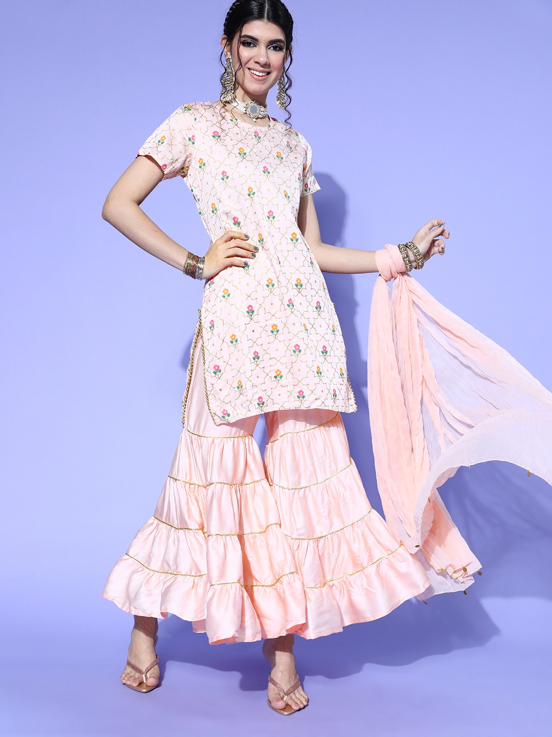 

Moda Rapido Peach-Coloured & Golden Gota Patti Kurta and Sharara Set