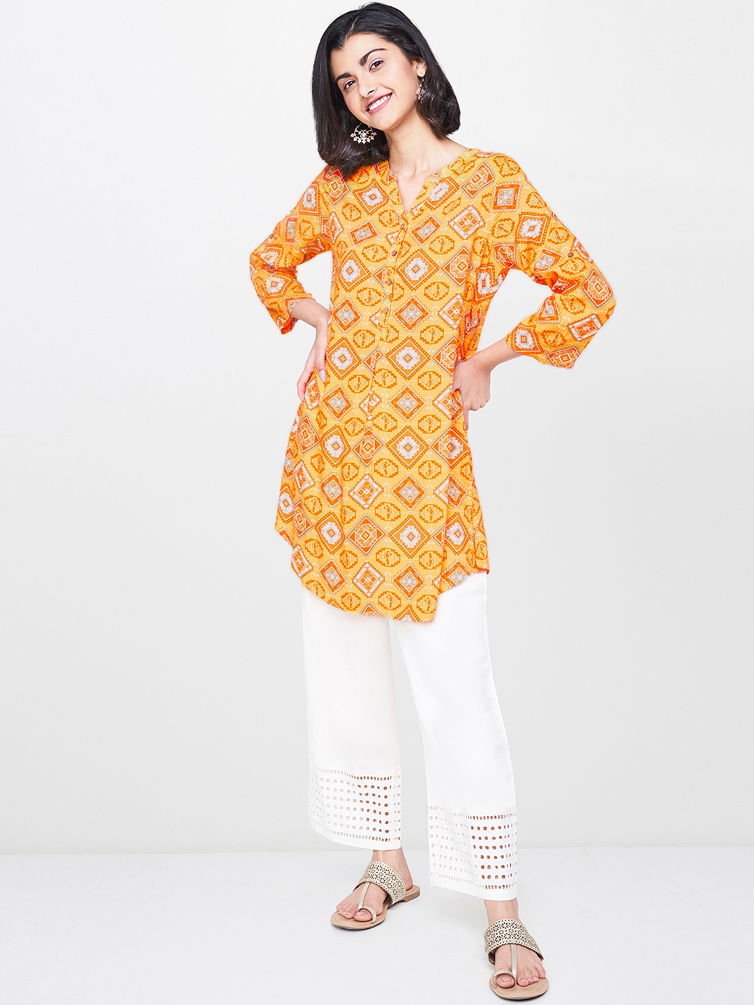 

Global Desi Women Mustard Yellow Printed Tunic
