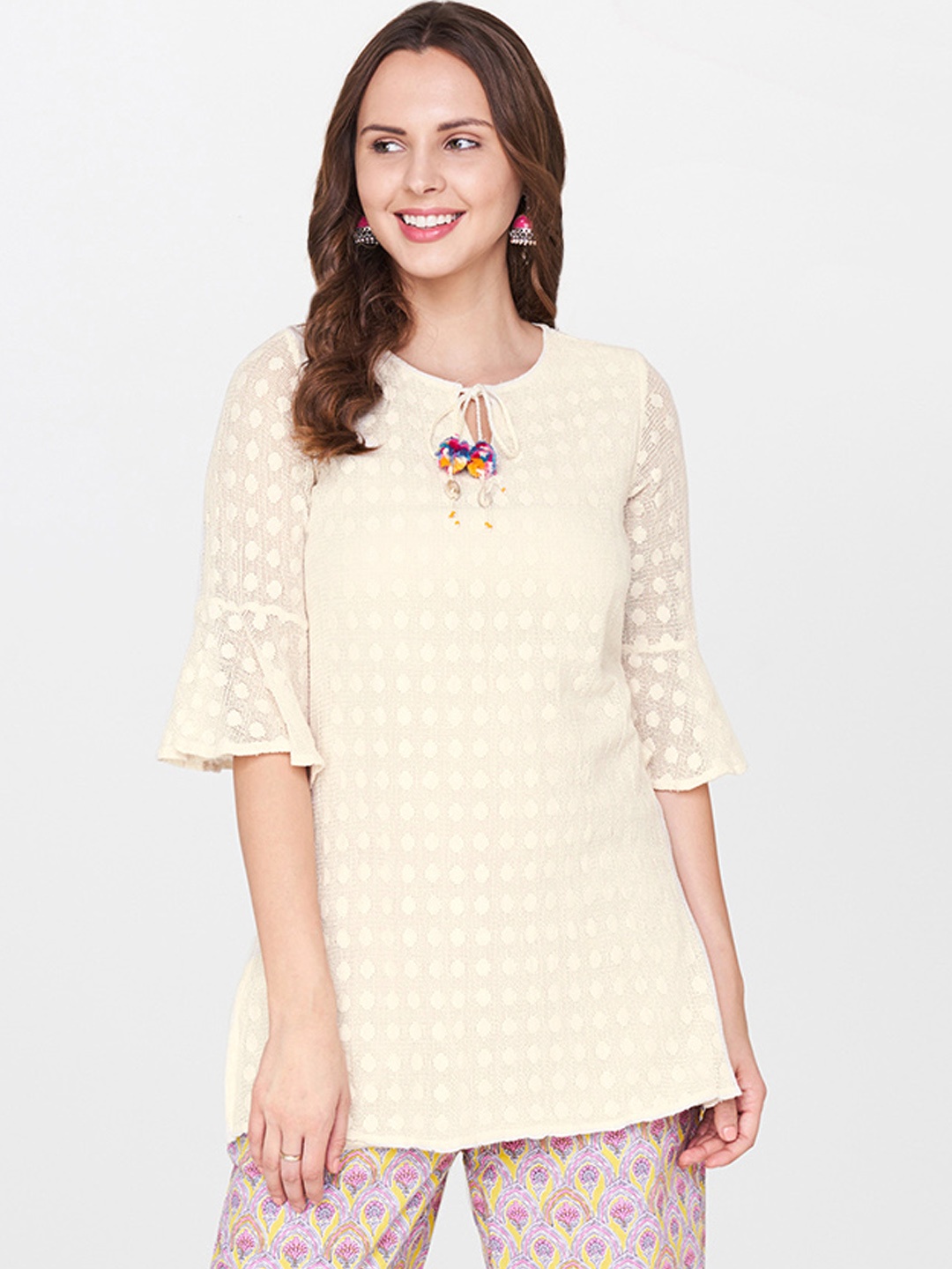

Global Desi Cream-Coloured Self Design Tunic