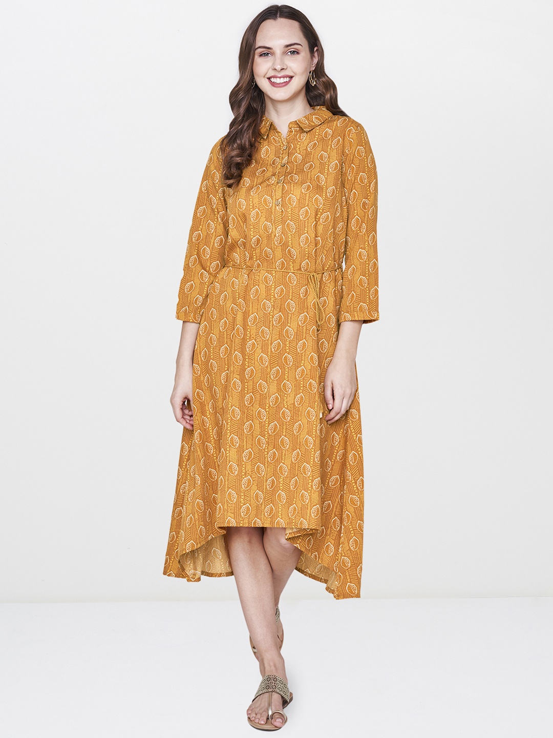 

Global Desi Women Mustard Yellow Printed A-Line High-Low Dress