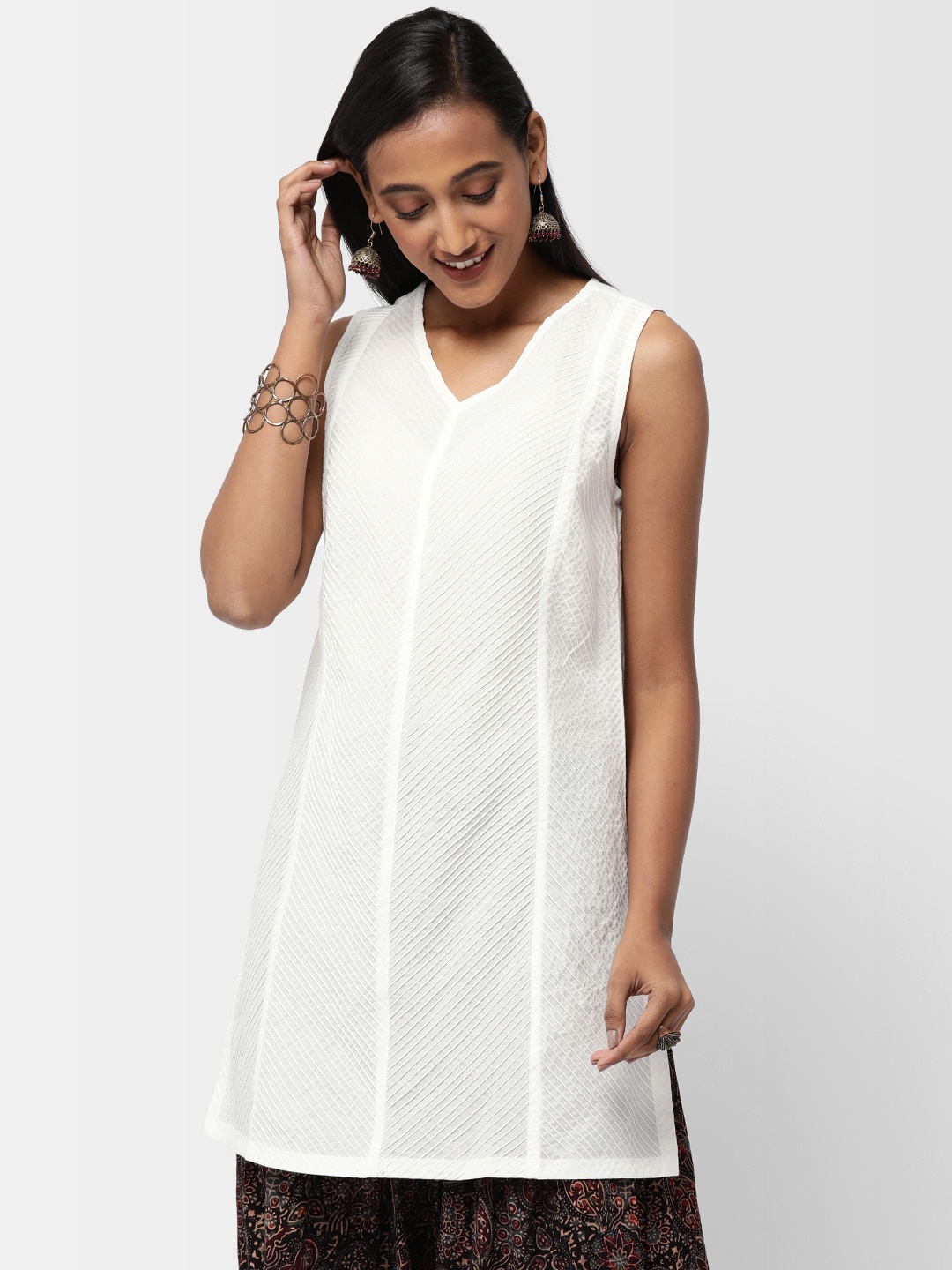 

Fabindia Women White Solid Tunic