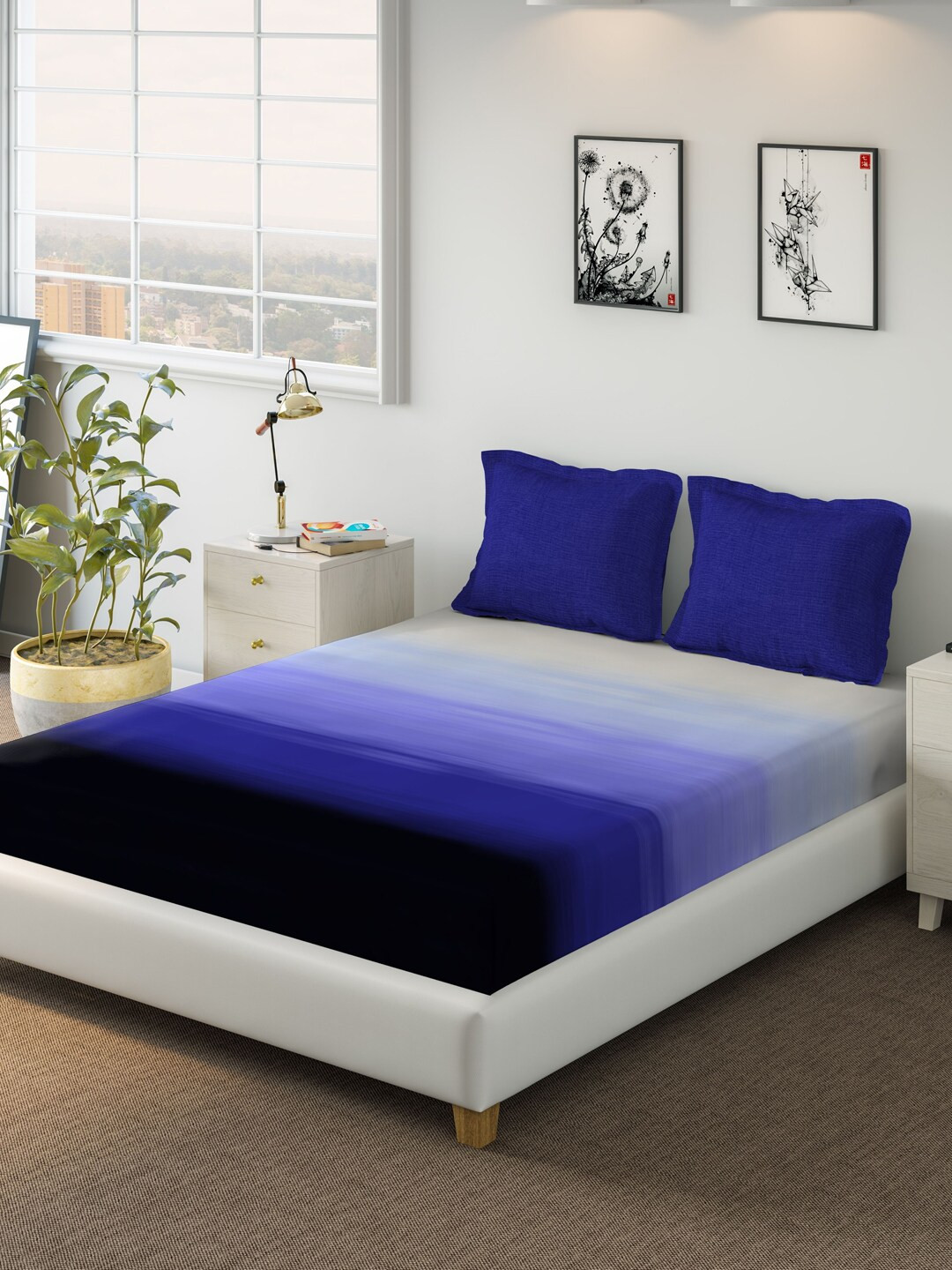 

DDecor Blue Solid 210 TC Cotton 1 King Bedsheet with 2 Pillow Covers