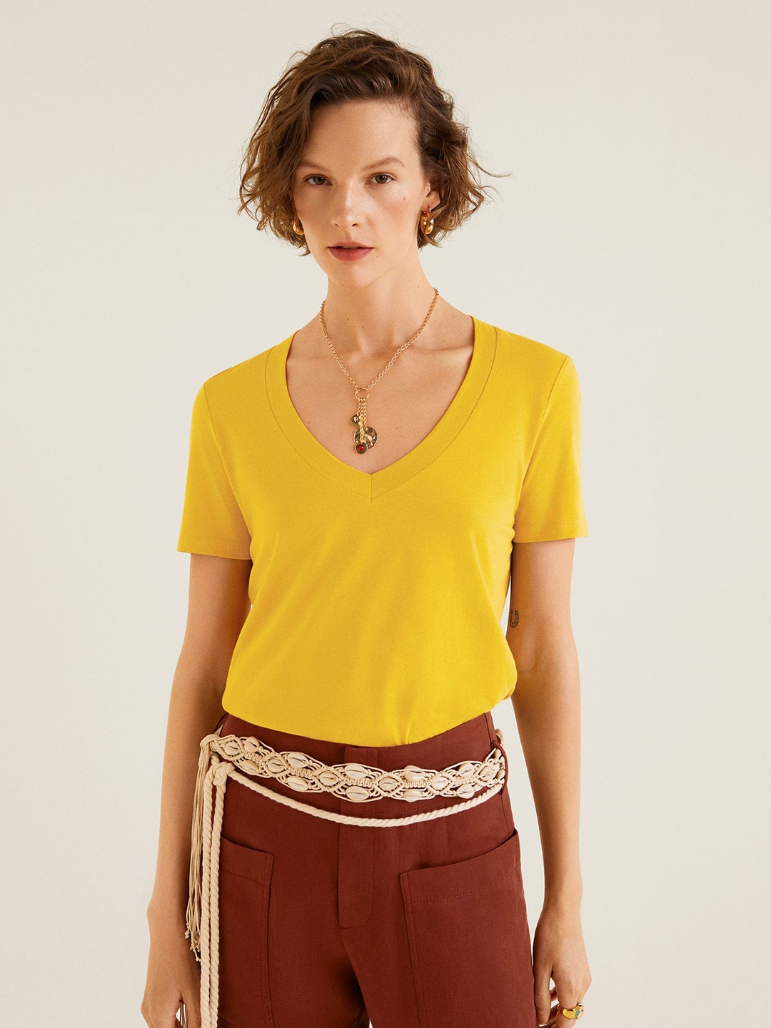 

MANGO Women Mustard Solid V-Neck T-shirt