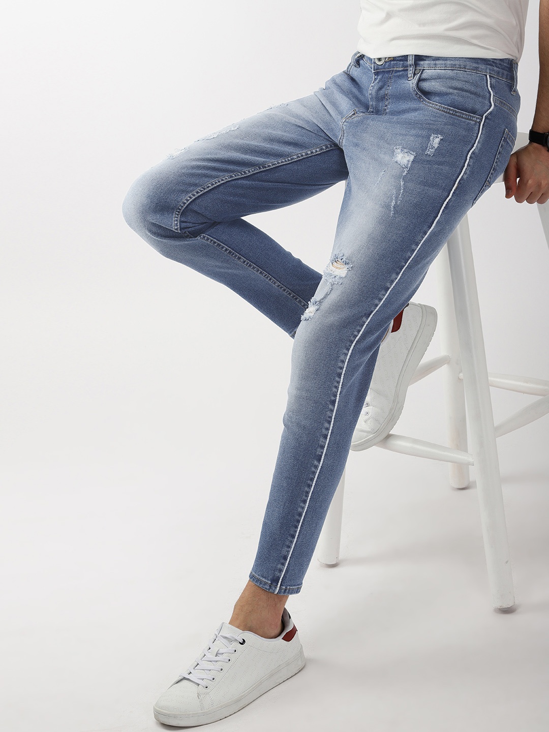

Mast & Harbour Men Blue Carrot Regular Fit Mid-Rise Mildly Distressed Stretchable Jeans