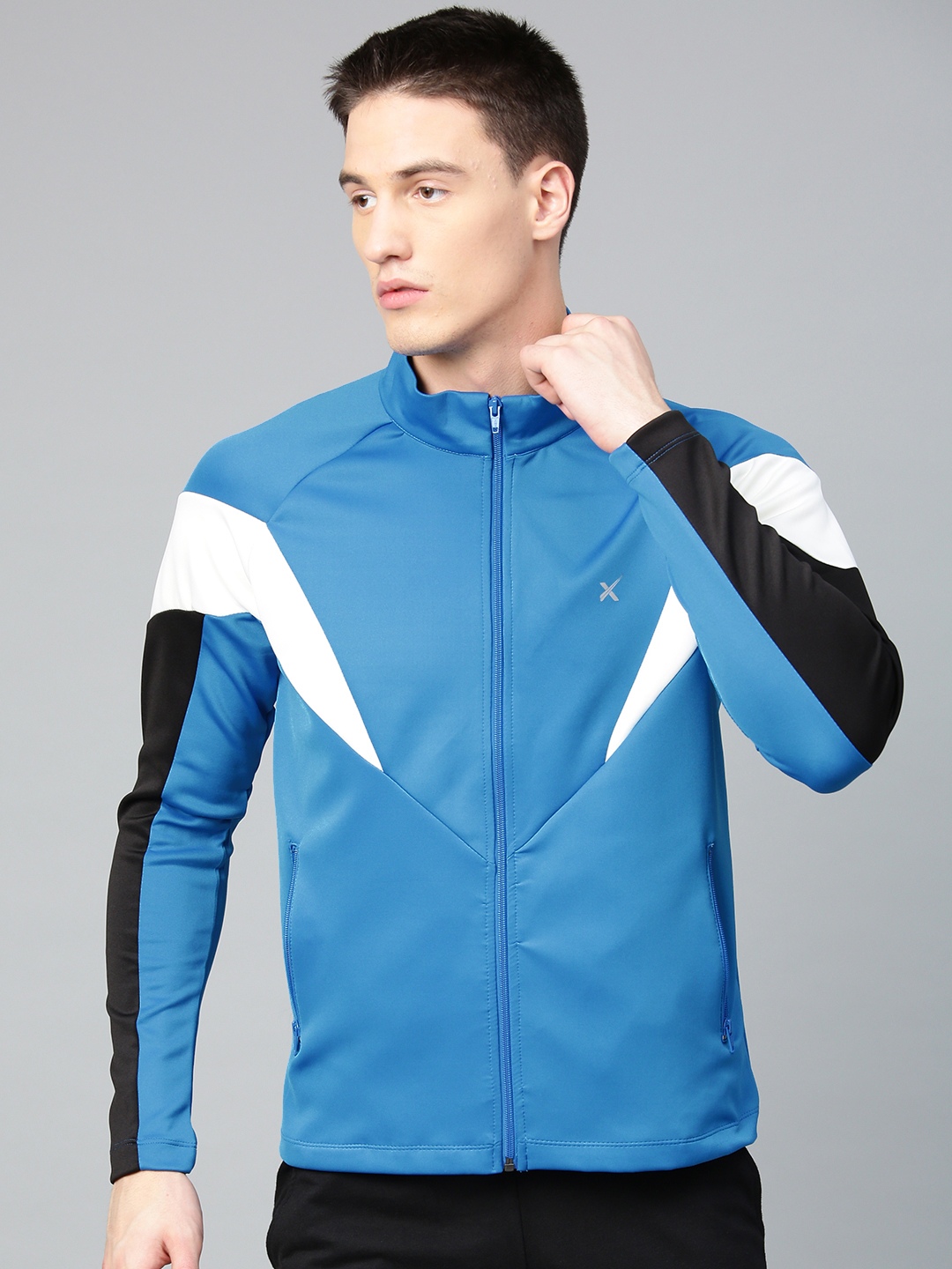 HRX by Hrithik Roshan Men Blue Solid Training Jacket - buy at the price ...