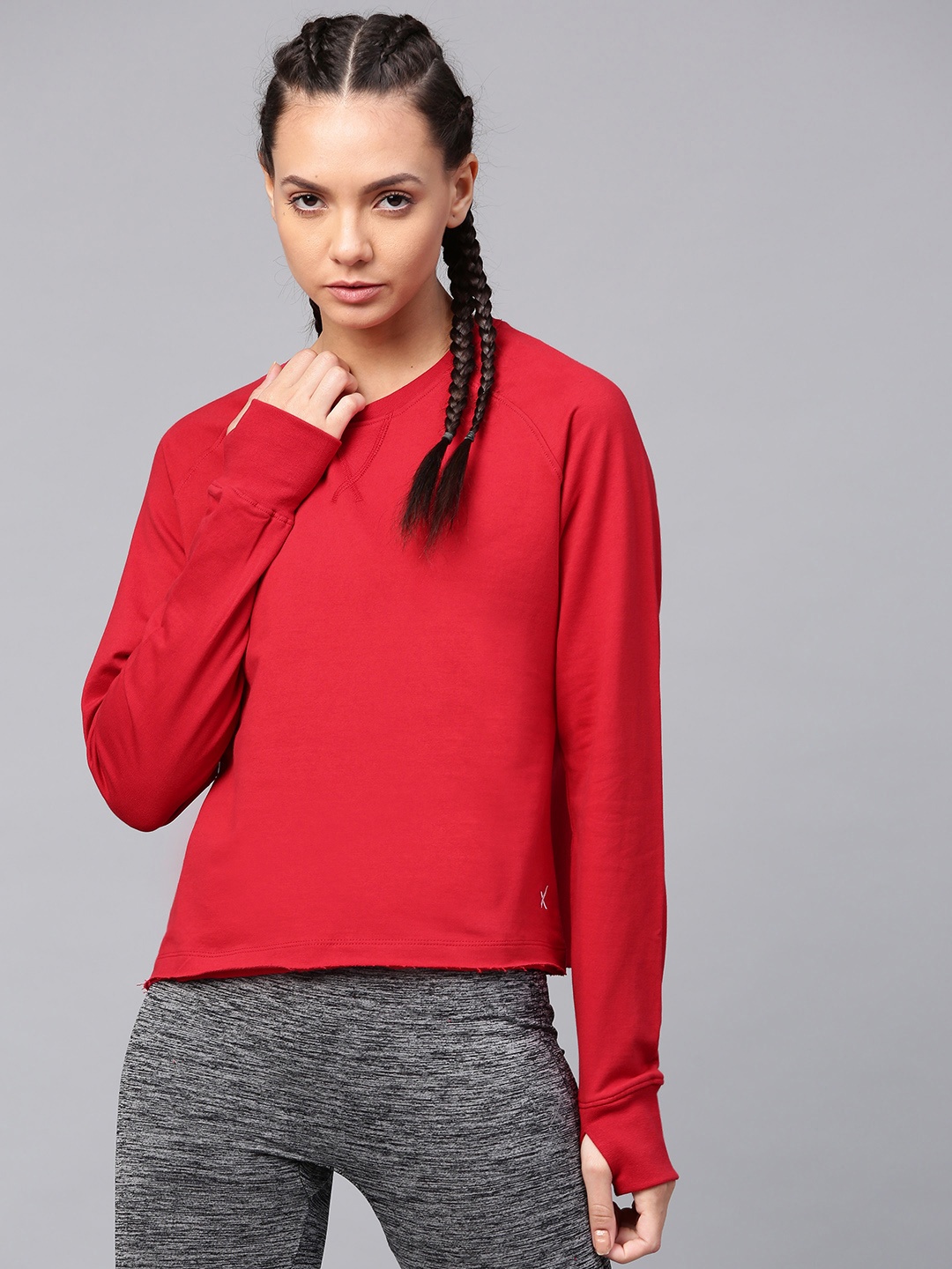 

HRX by Hrithik Roshan Women Red Solid Sweatshirt