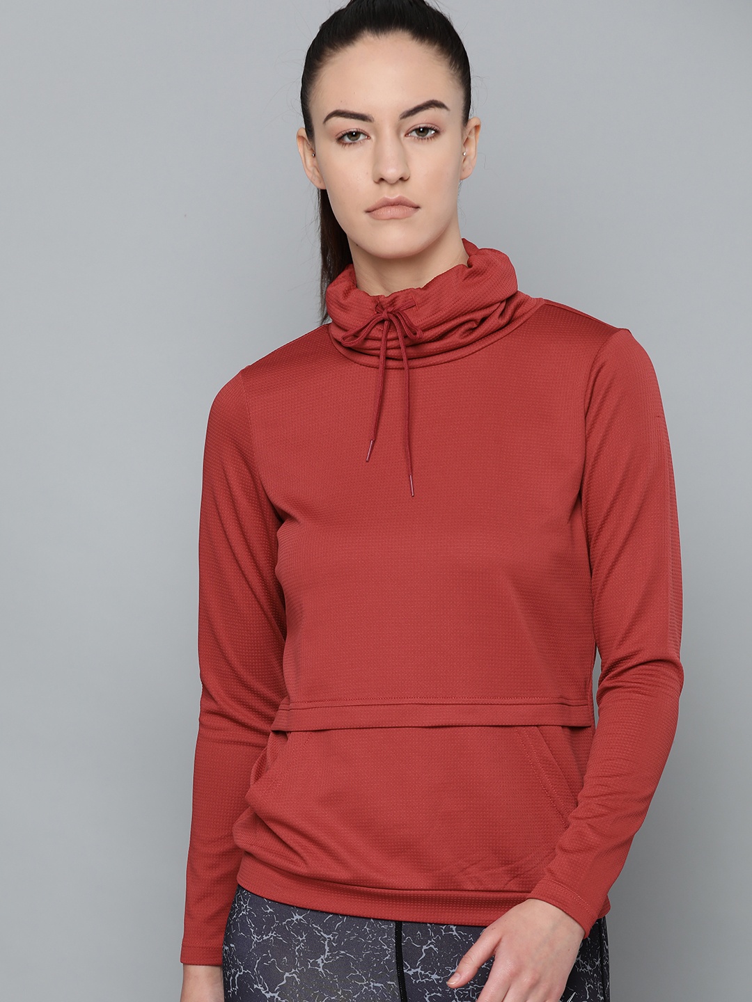 

HRX by Hrithik Roshan Women Training Rapid Dry Round Neck Self Design Sweatshirt, Rust