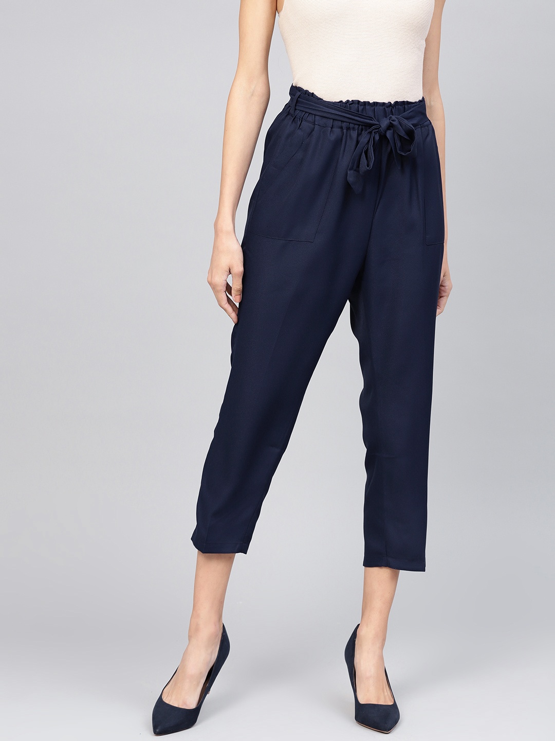 

SASSAFRAS Women Navy Blue Tapered Fit Solid Peg Trousers