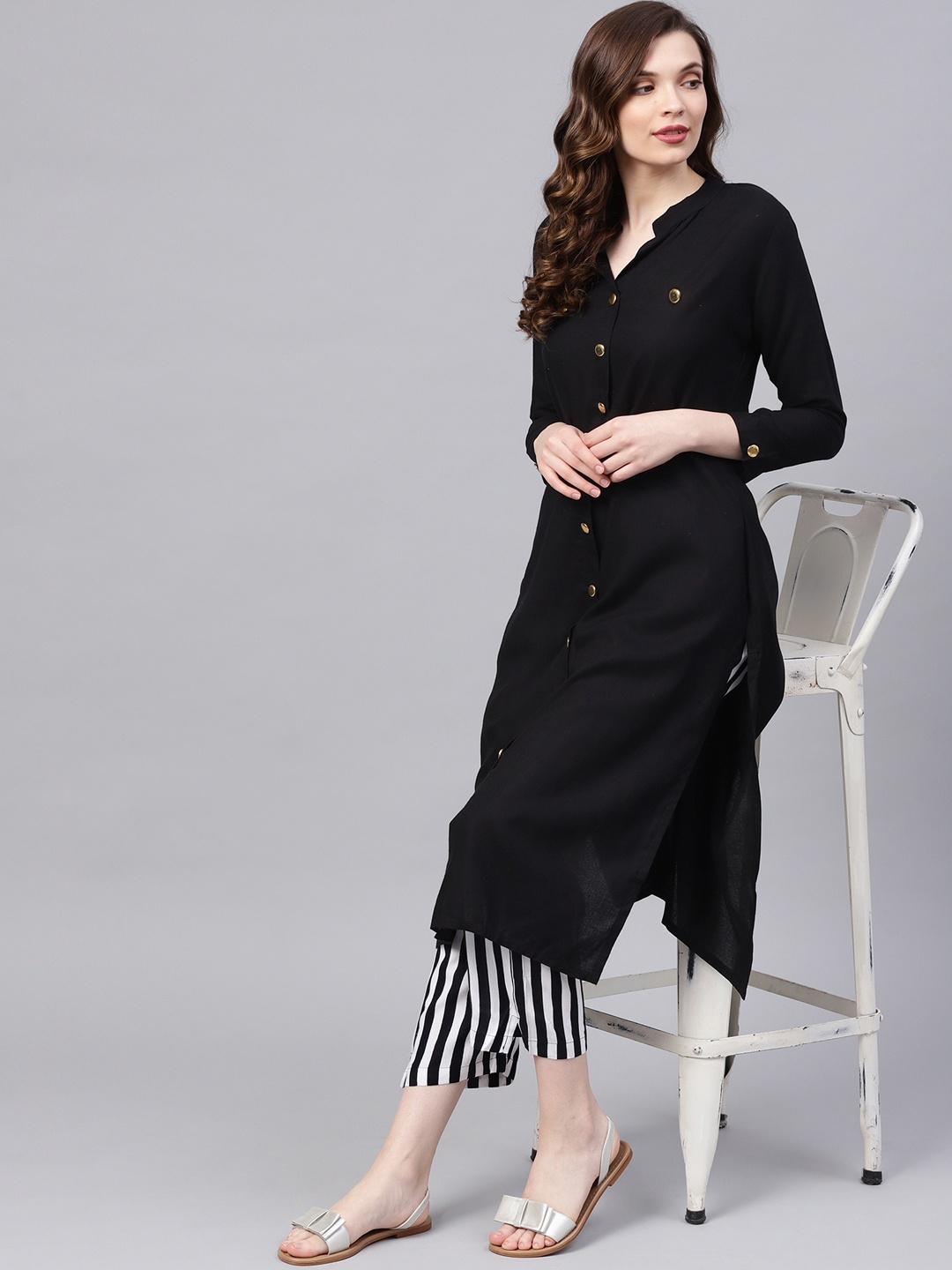 

Ishin Women Black Solid Kurta with Trousers