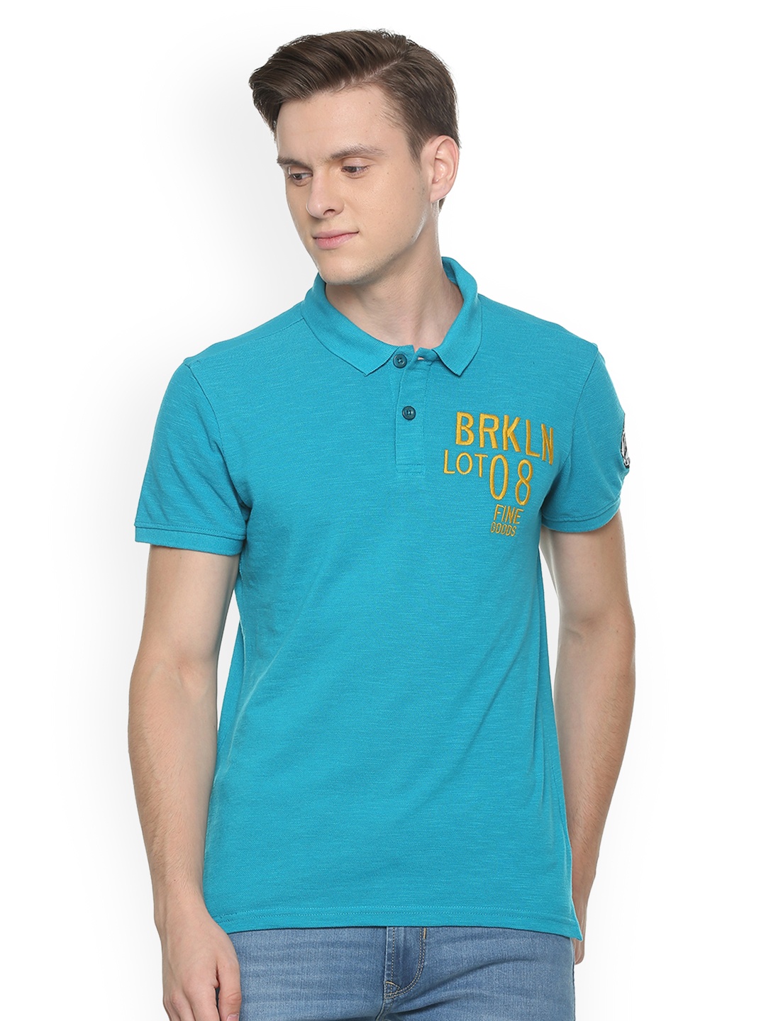 

People Men Blue Solid Polo Collar T-shirt