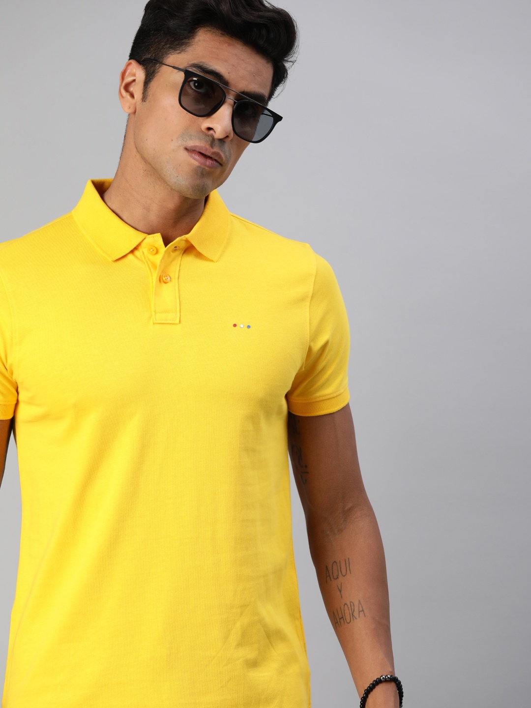 

Harvard Men Yellow Solid Polo Collar T-shirt