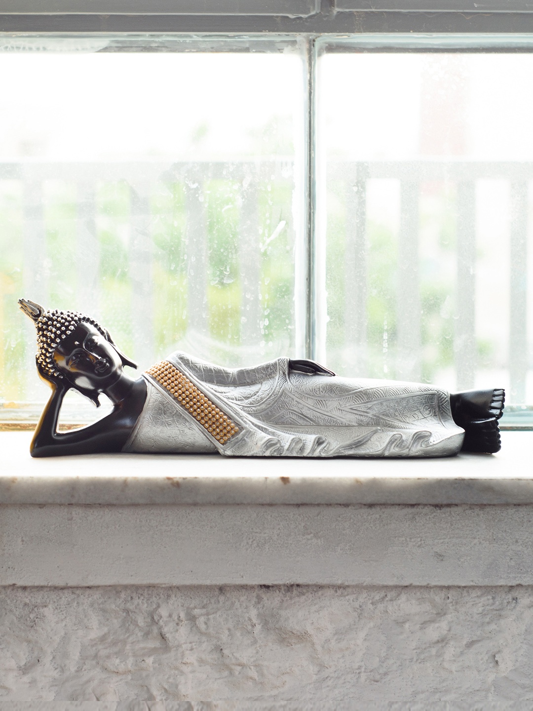 

eCraftIndia Silver-Toned & Black Reclining Buddha Antique Showpiece