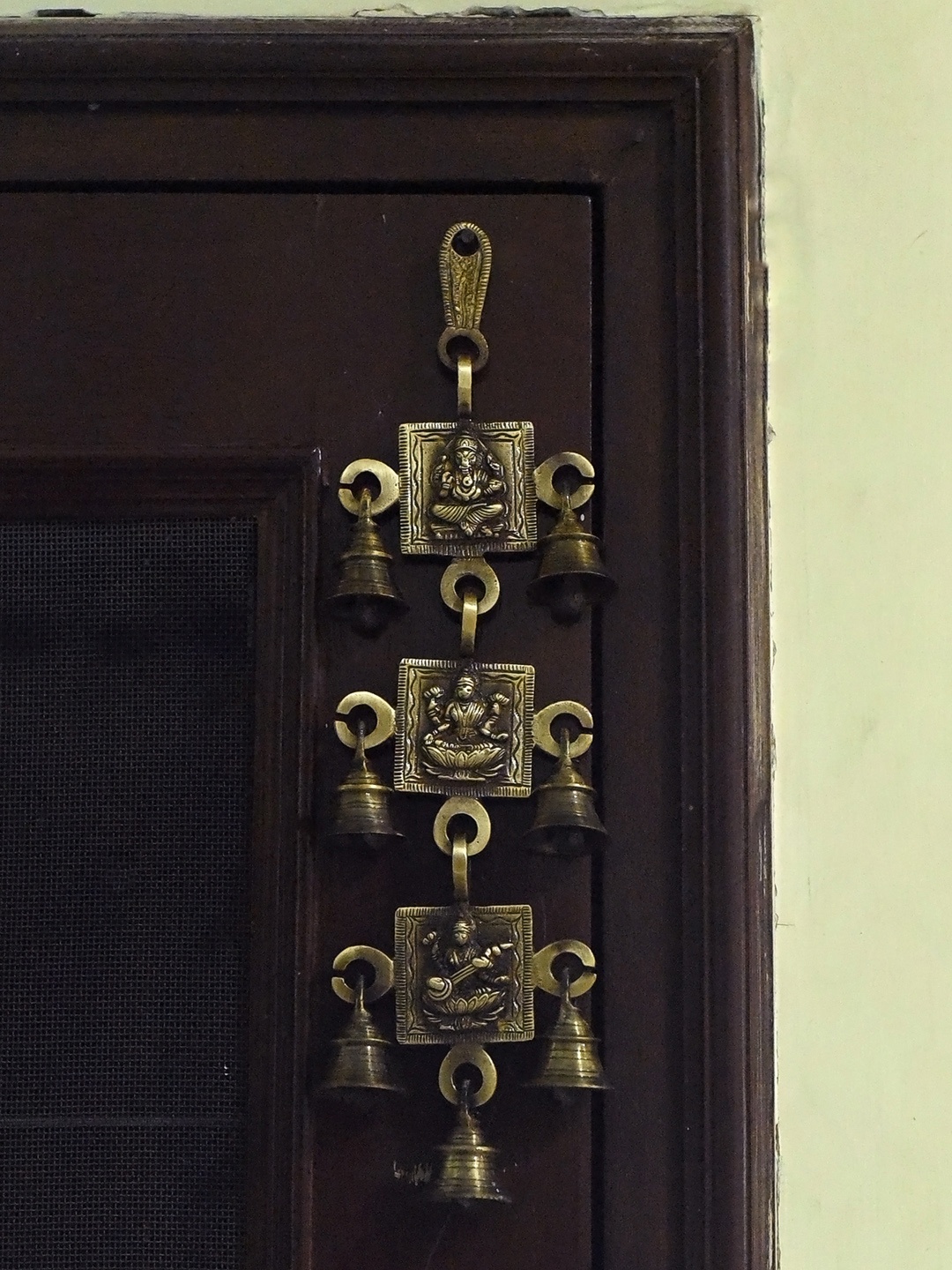 

eCraftIndia Brown Ganesha Laxmi Saraswati Wall Hanging Bells