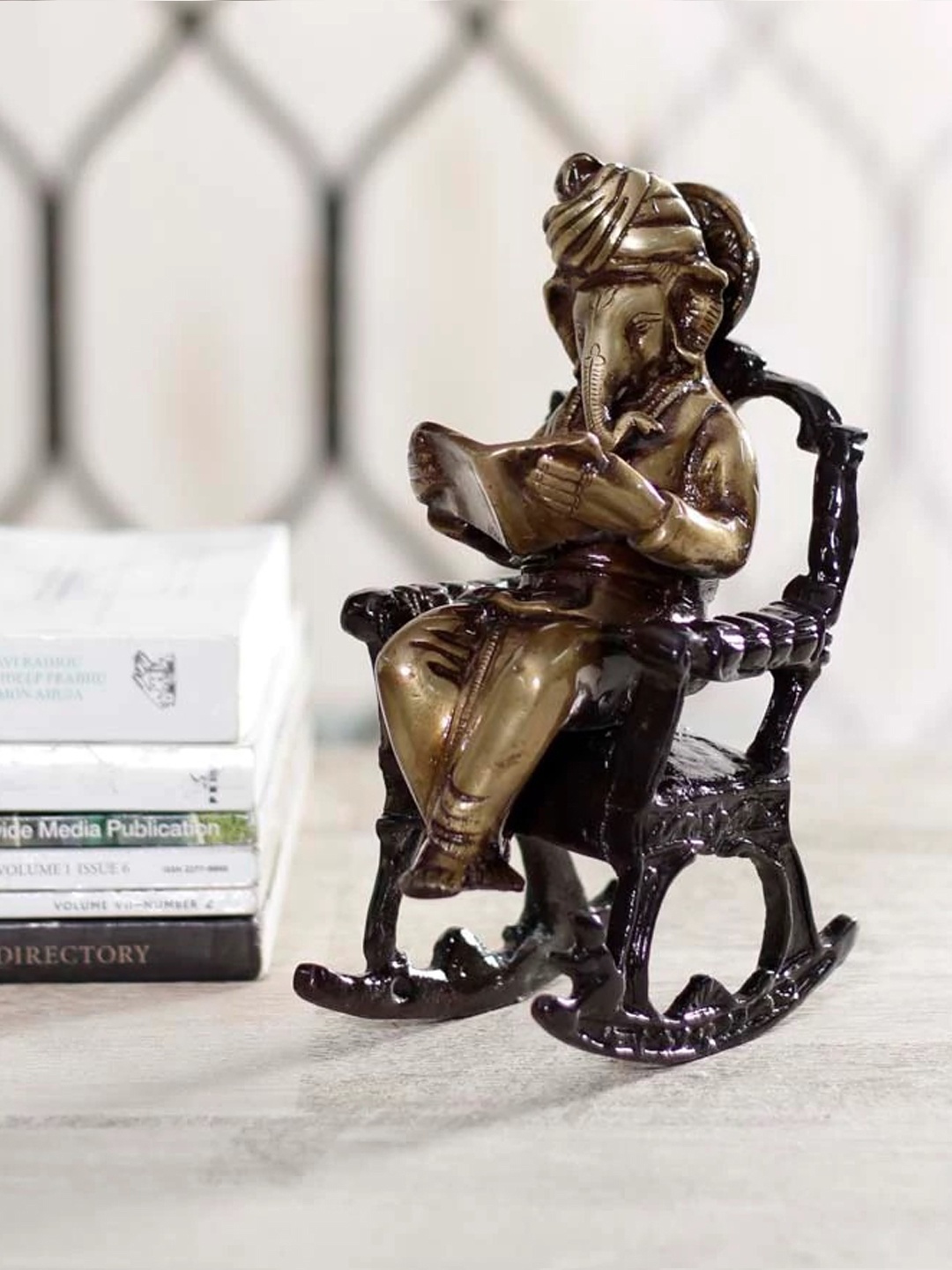 

eCraftIndia Brown & Black Lord Ganesha on Rocking Chair Showpiece