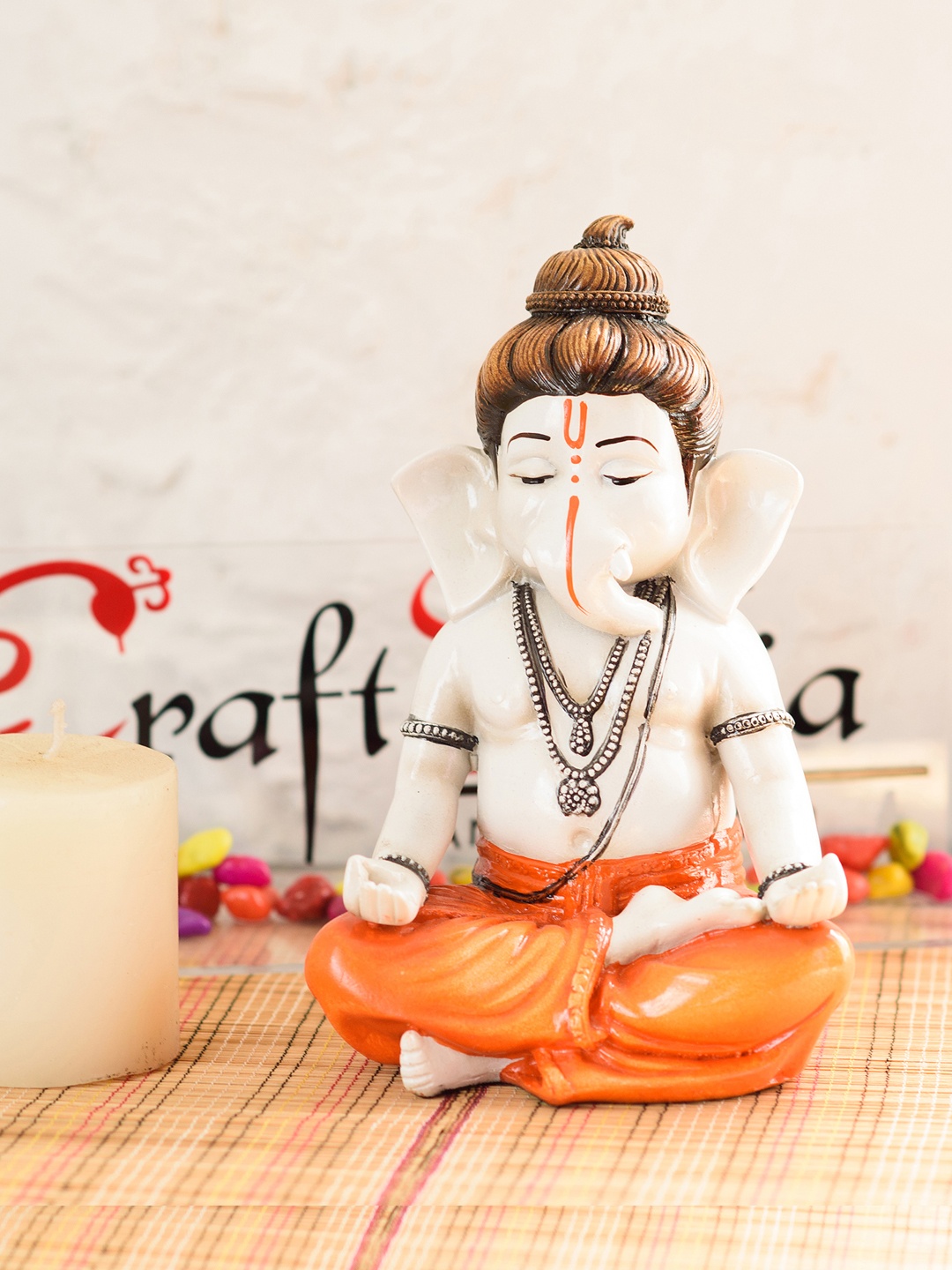 

eCraftIndia Cream-Coloured & Orange Ganesha Statue Showpiece