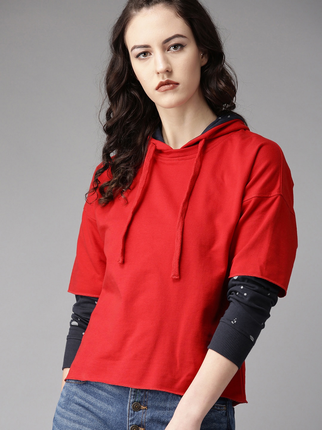 

The Roadster Lifestyle Co Women Red Solid Hooded Sweatshirt