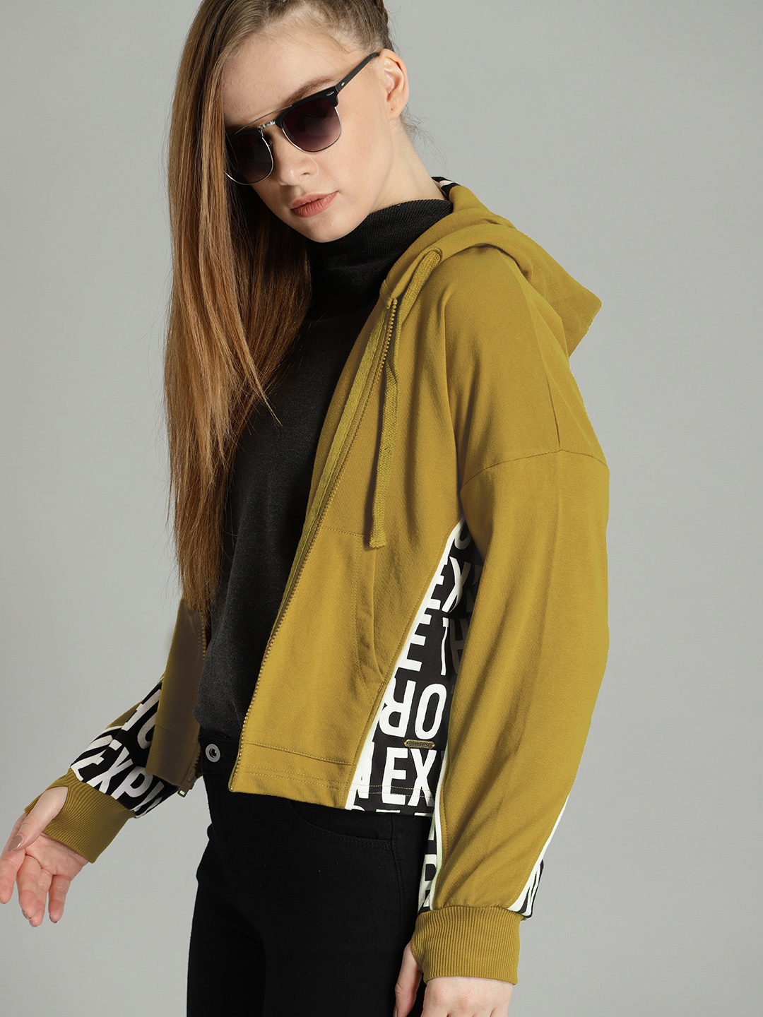 

The Roadster Lifestyle Co Women Green Printed Hooded Sweatshirt