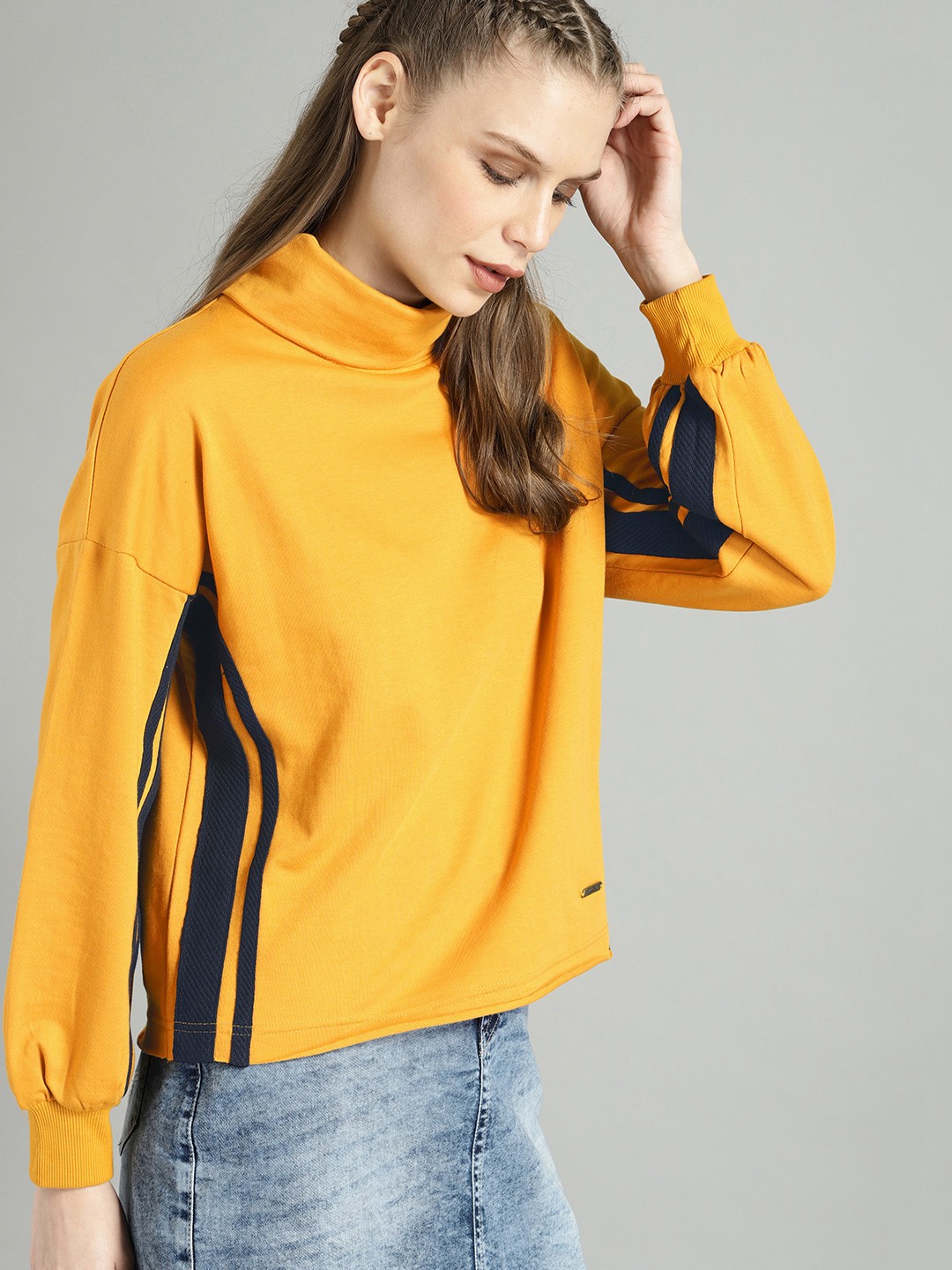 

The Roadster Lifestyle Co Women Mustard Yellow Solid Sweatshirt
