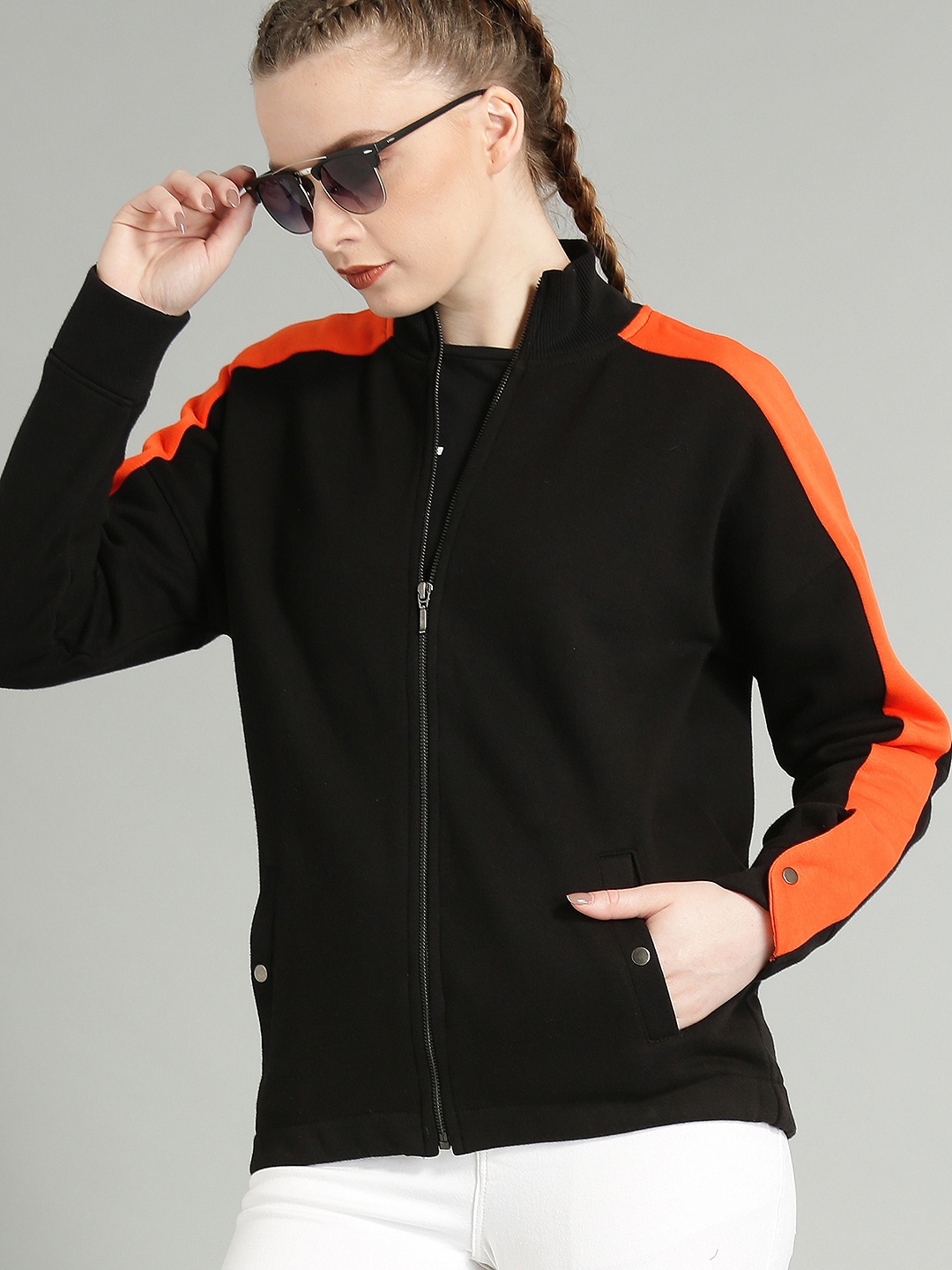 

The Roadster Lifestyle Co Women Black & Orange Solid Sweatshirt