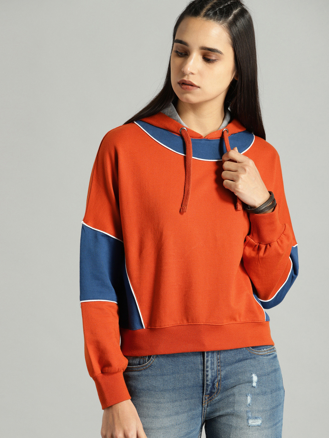 

The Roadster Lifestyle Co Women Rust & Blue Colourblocked Hooded Sweatshirt
