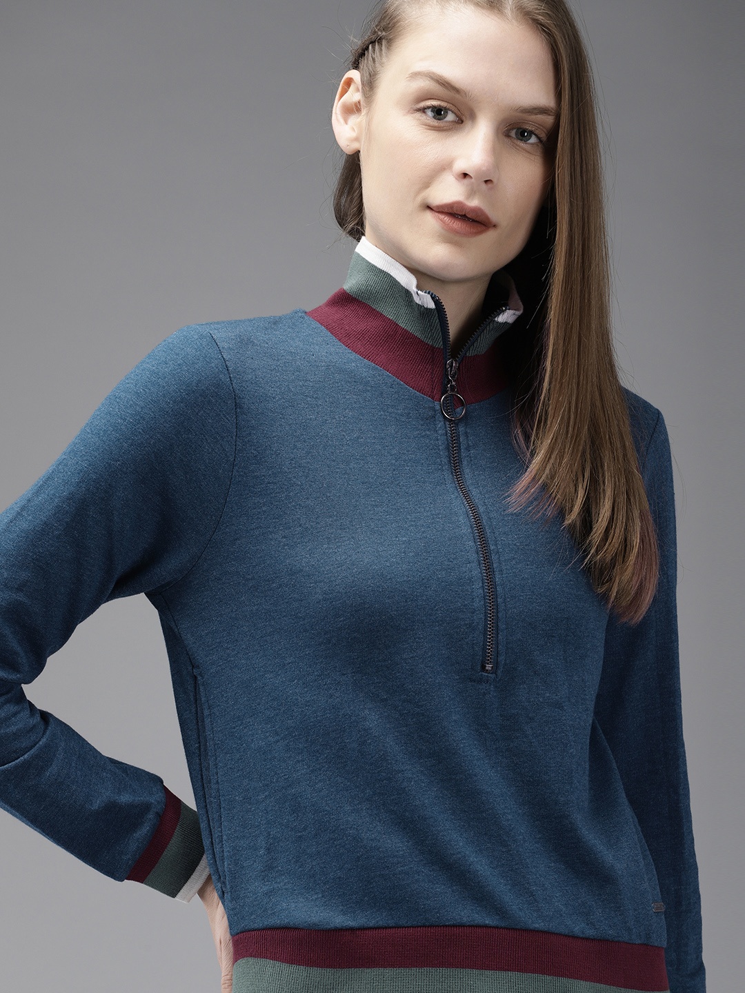 

The Roadster Lifestyle Co Women Blue Solid Sweatshirt