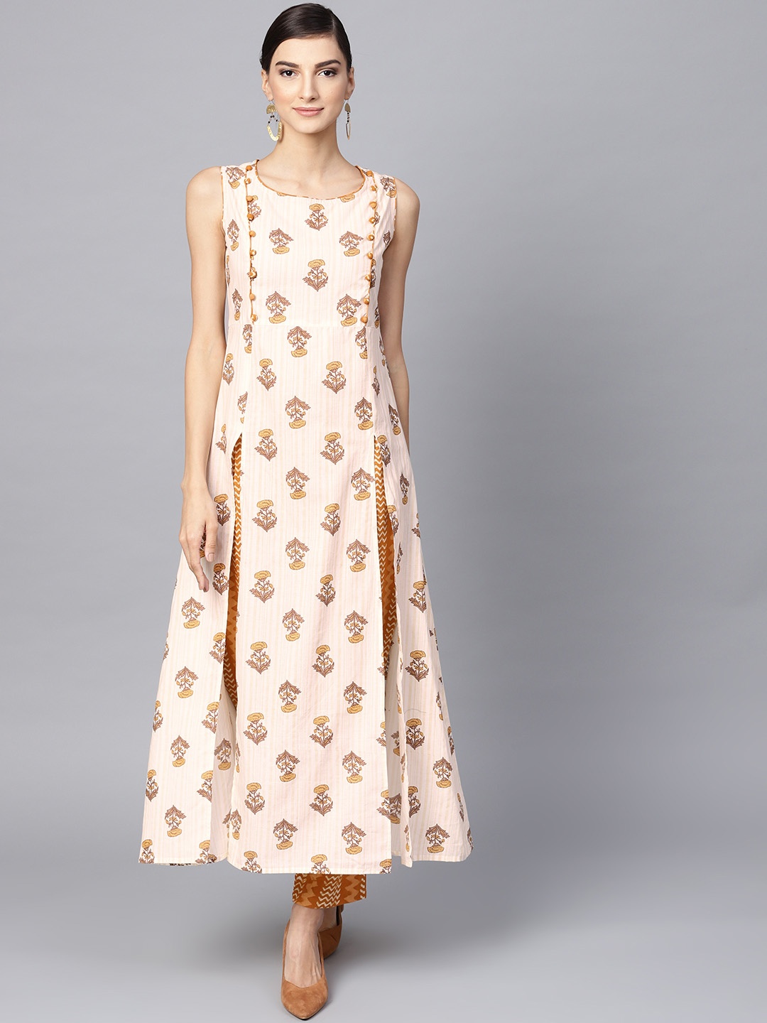 

Meeranshi Women Off-White & Mustard Yellow Printed Kurta with Trousers