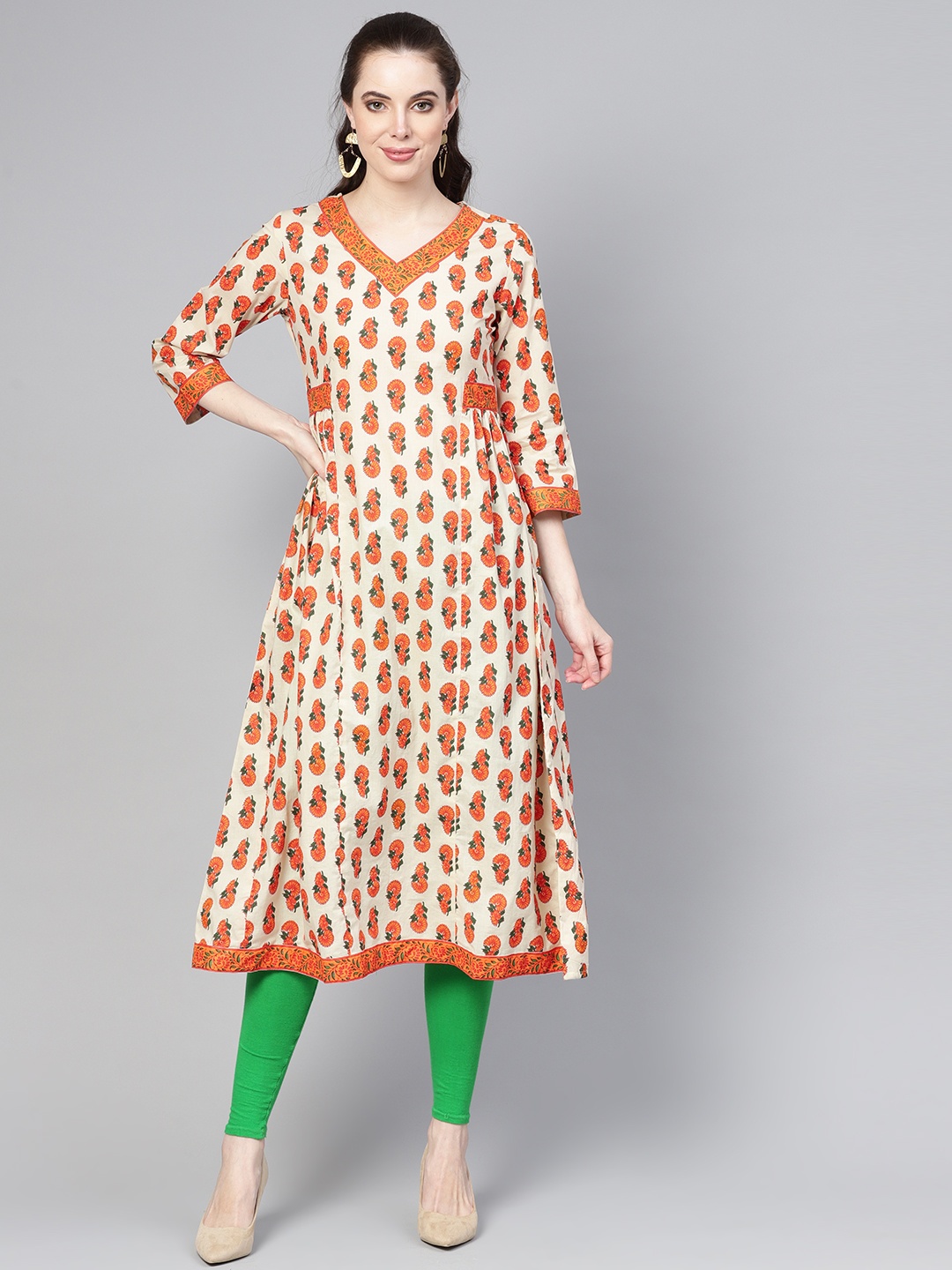 

Meeranshi Women Cream-Coloured & Orange Printed A-Line Kurta
