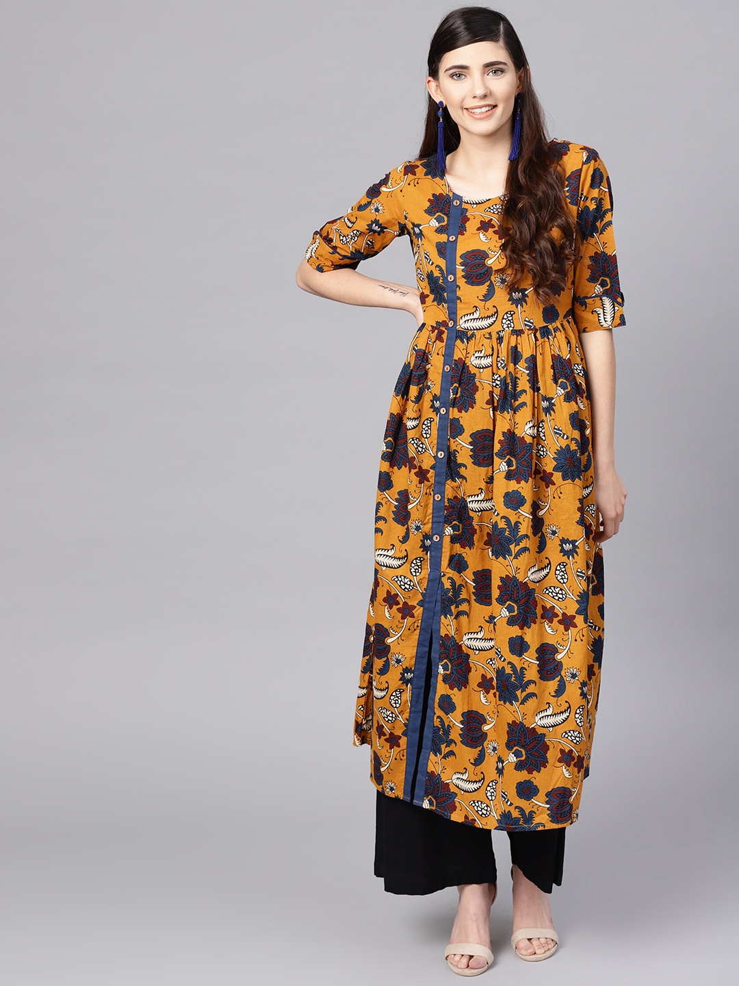 

Varanga Women Mustard Yellow & Navy Blue Screen Print A-Line Kurta