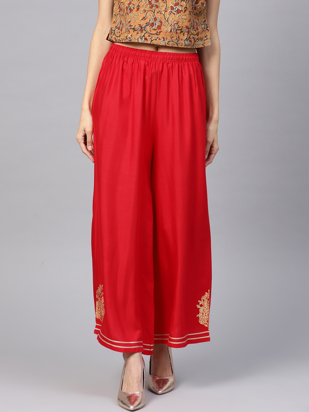 

PINKSKY Women Red Flared Solid Palazzos