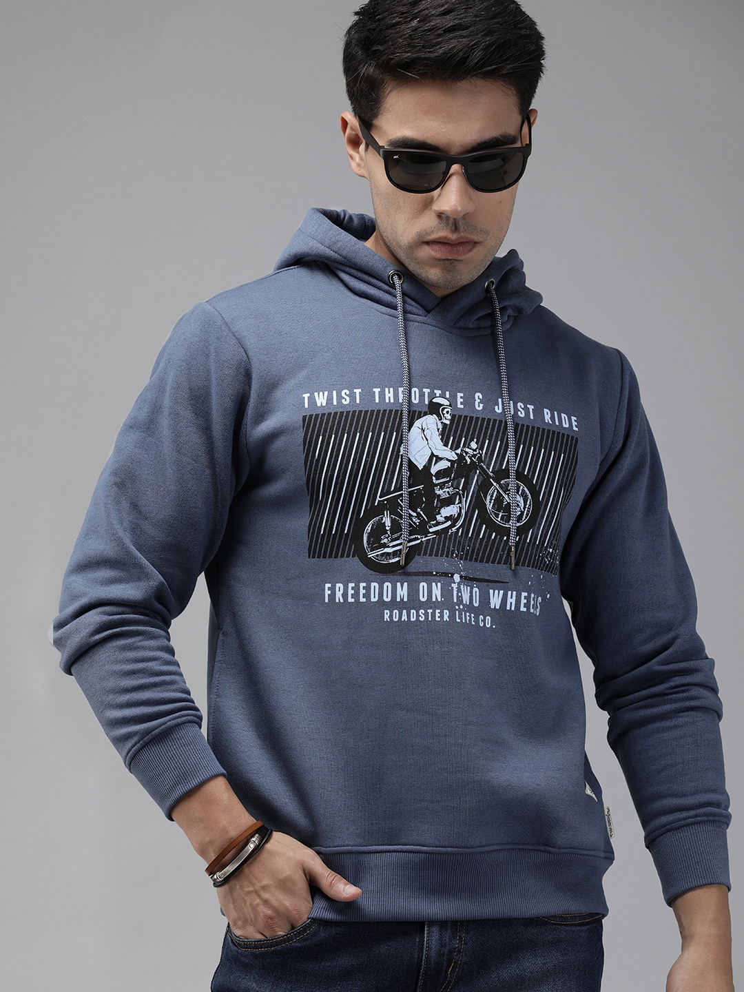 

The Roadster Lifestyle Co Men Blue Biker Graphic Printed Hooded Sweatshirt
