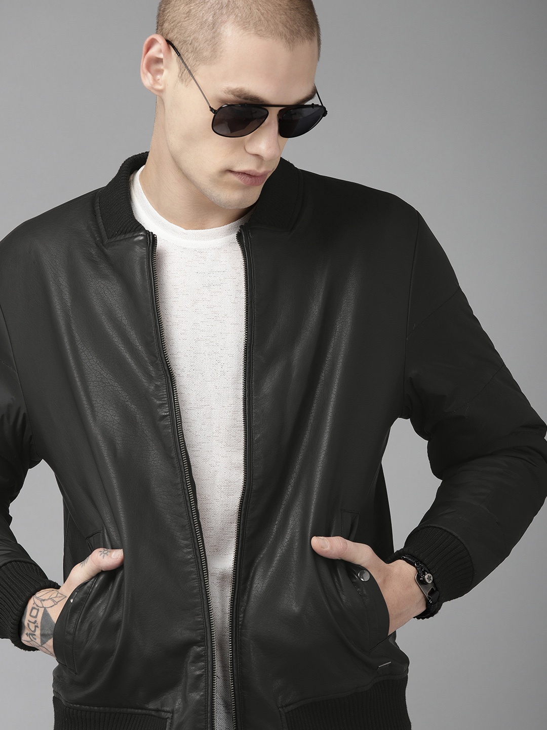 

The Roadster Lifestyle Co Men Black Solid Jacket