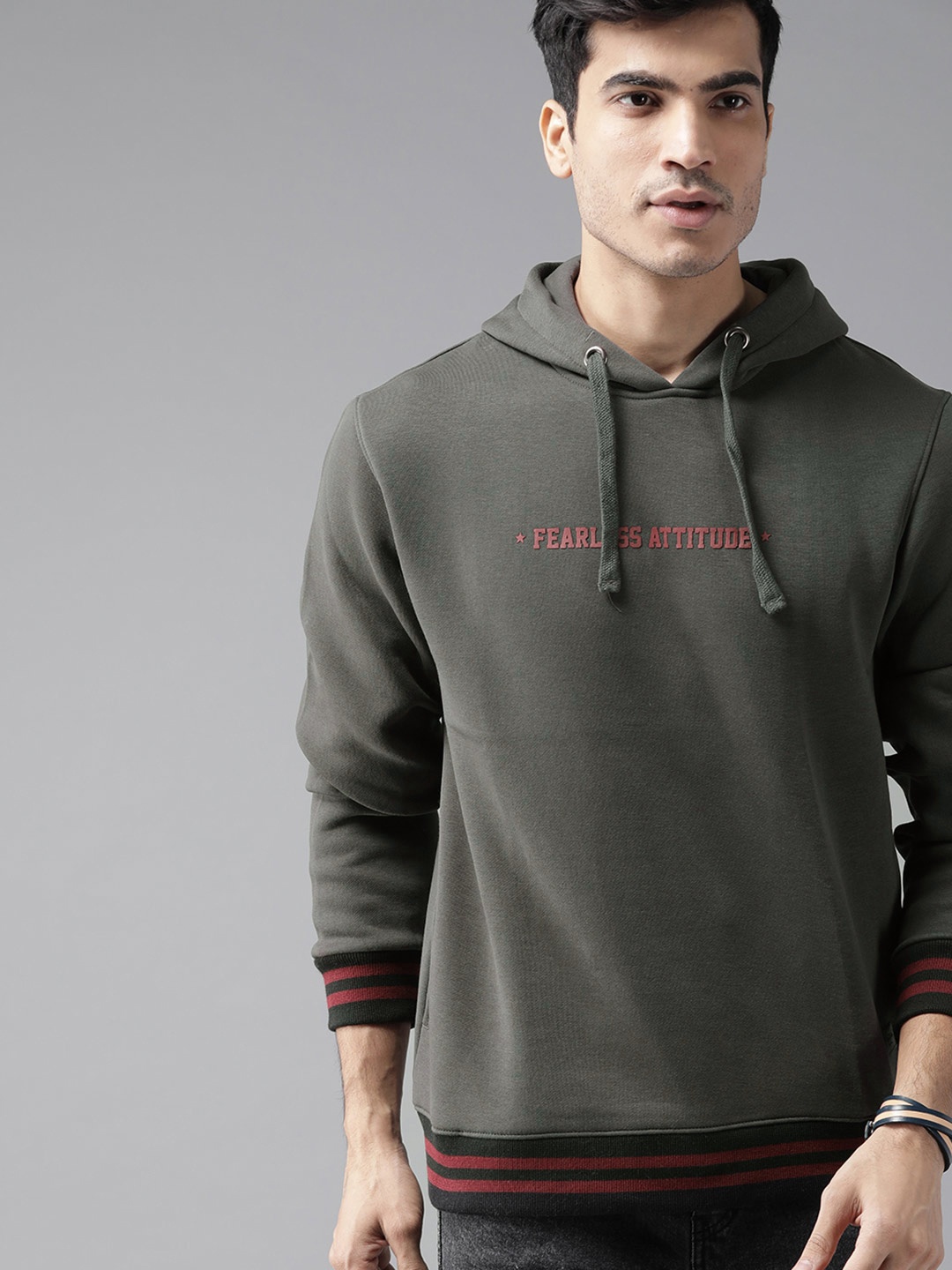 

The Roadster Lifestyle Co Men Charcoal Grey Solid Hooded Sweatshirt