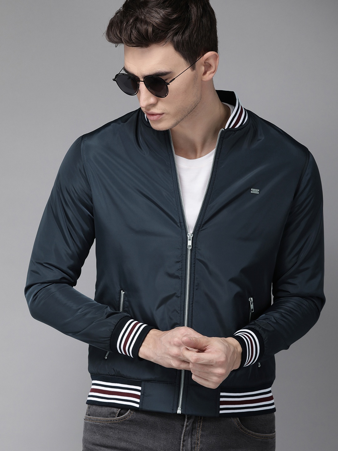 

The Roadster Lifestyle Co Men Navy Blue Solid Bomber Jacket