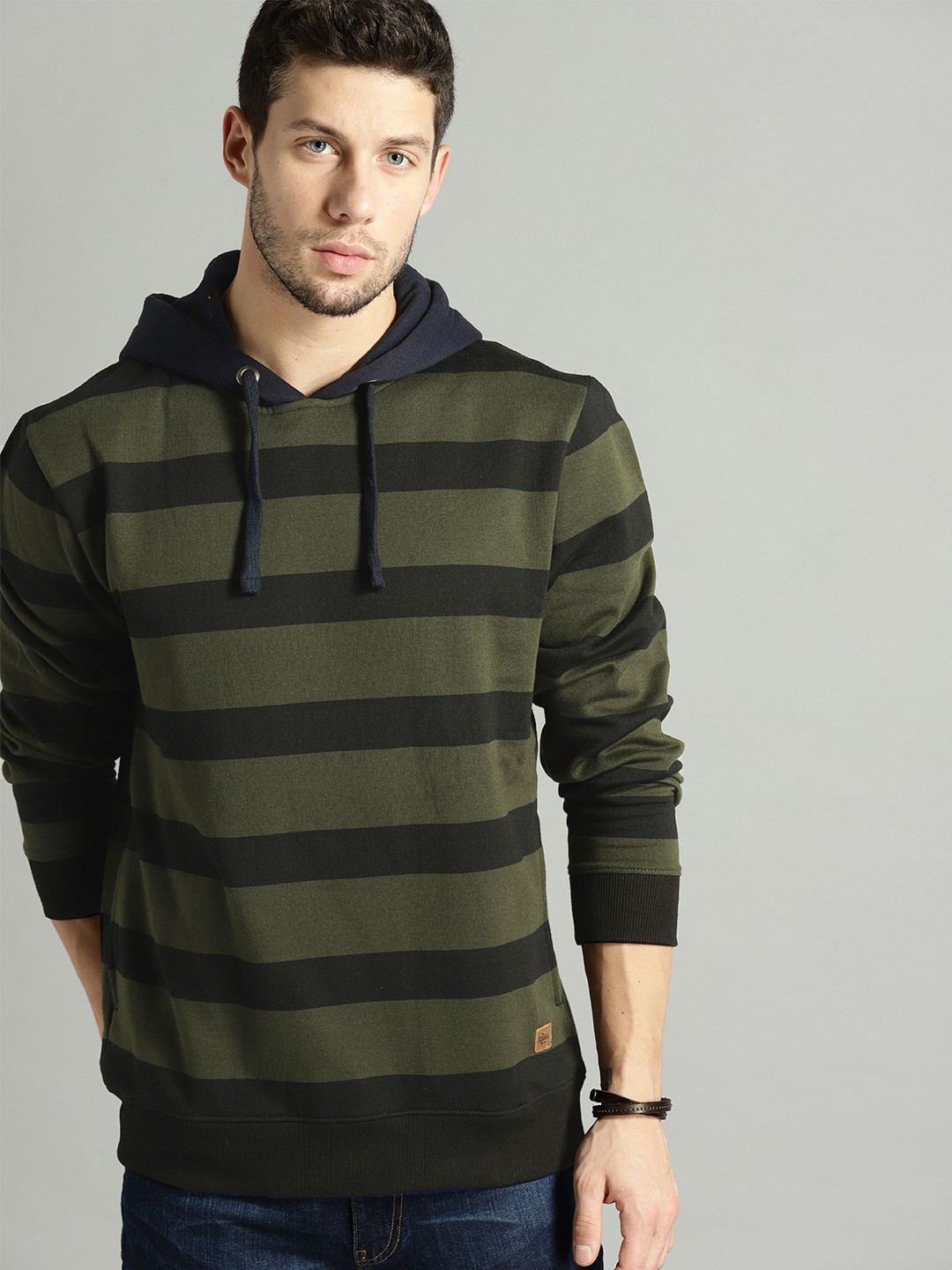 

The Roadster Lifestyle Co Men Olive Green & Black Striped Hooded Sweatshirt