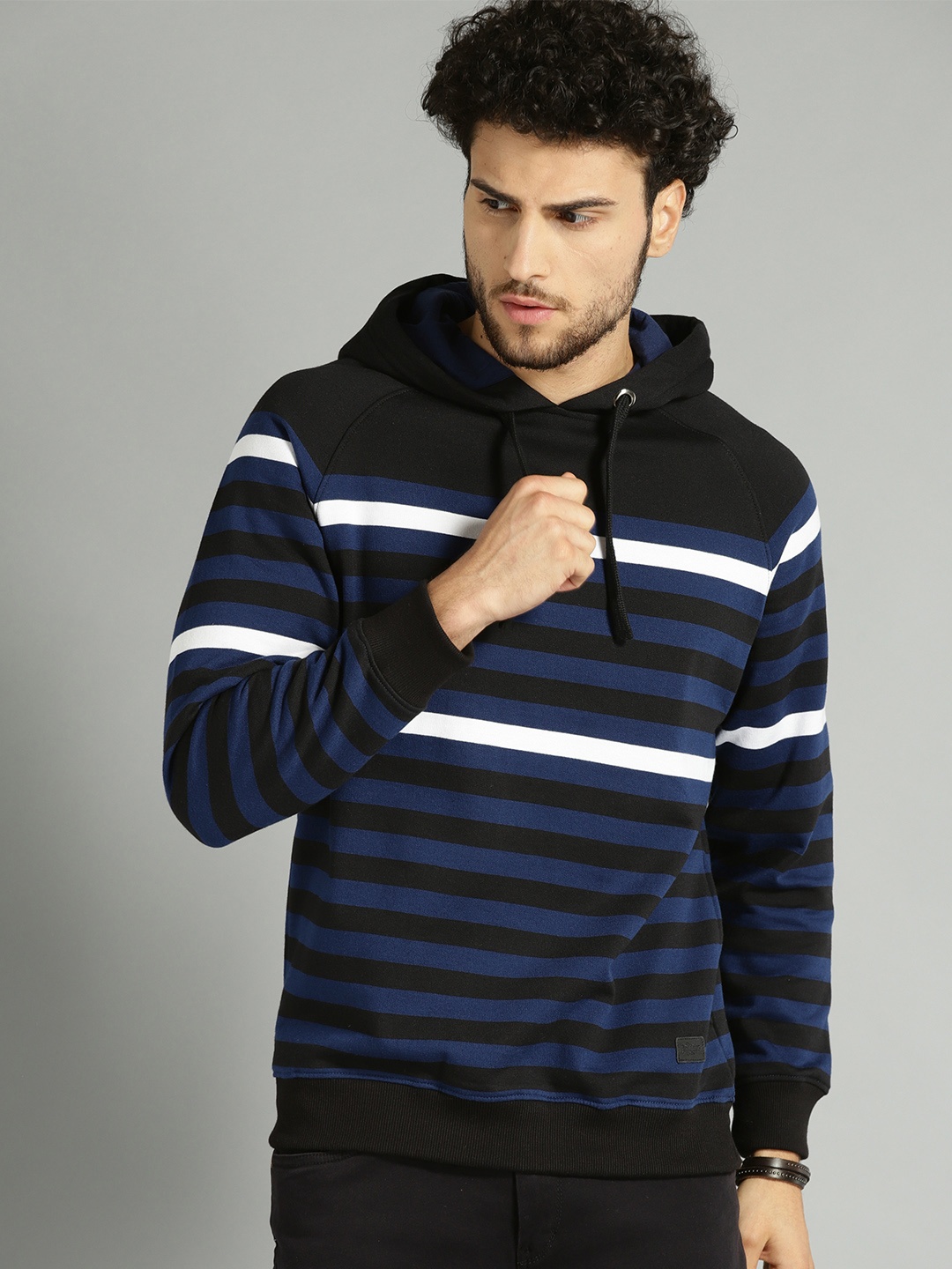 

The Roadster Lifestyle Co Men Navy Blue & Black Striped Hooded Sweatshirt