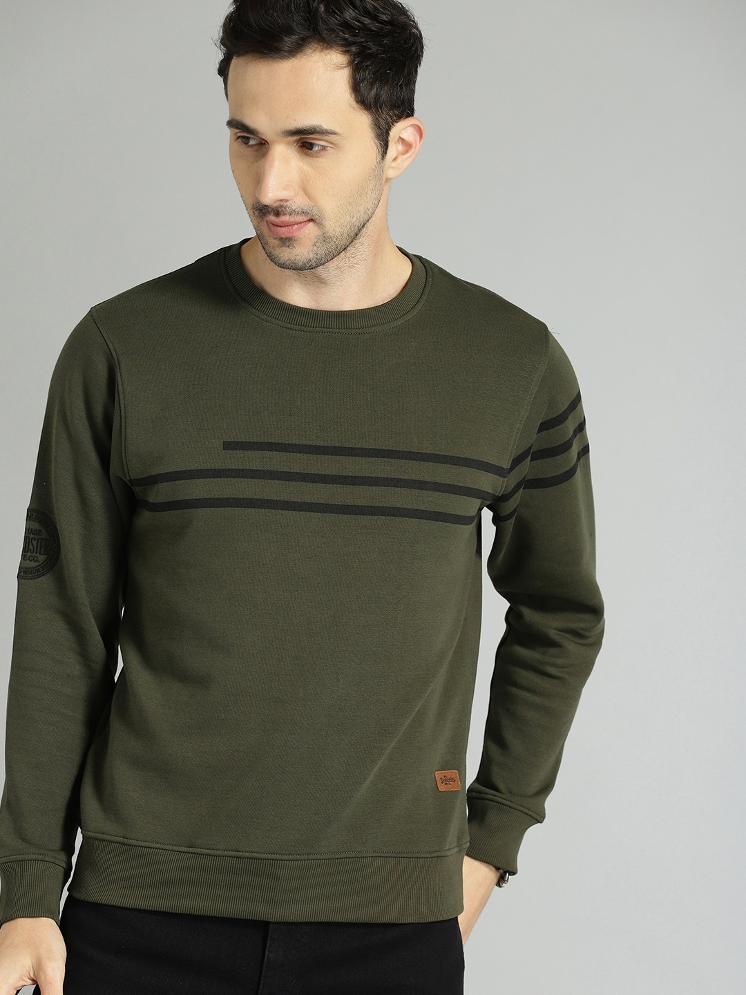 

The Roadster Lifestyle Co Men Olive Green & Black Striped Sweatshirt